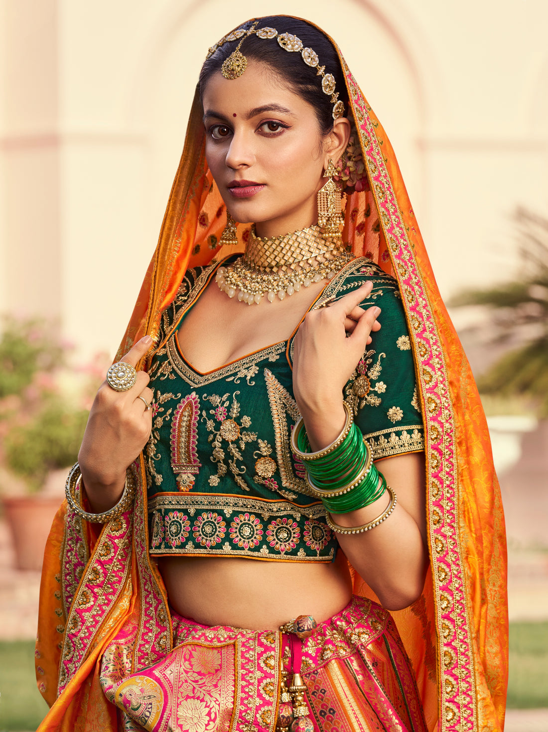 Green and orange Banarasi lehenga choli

