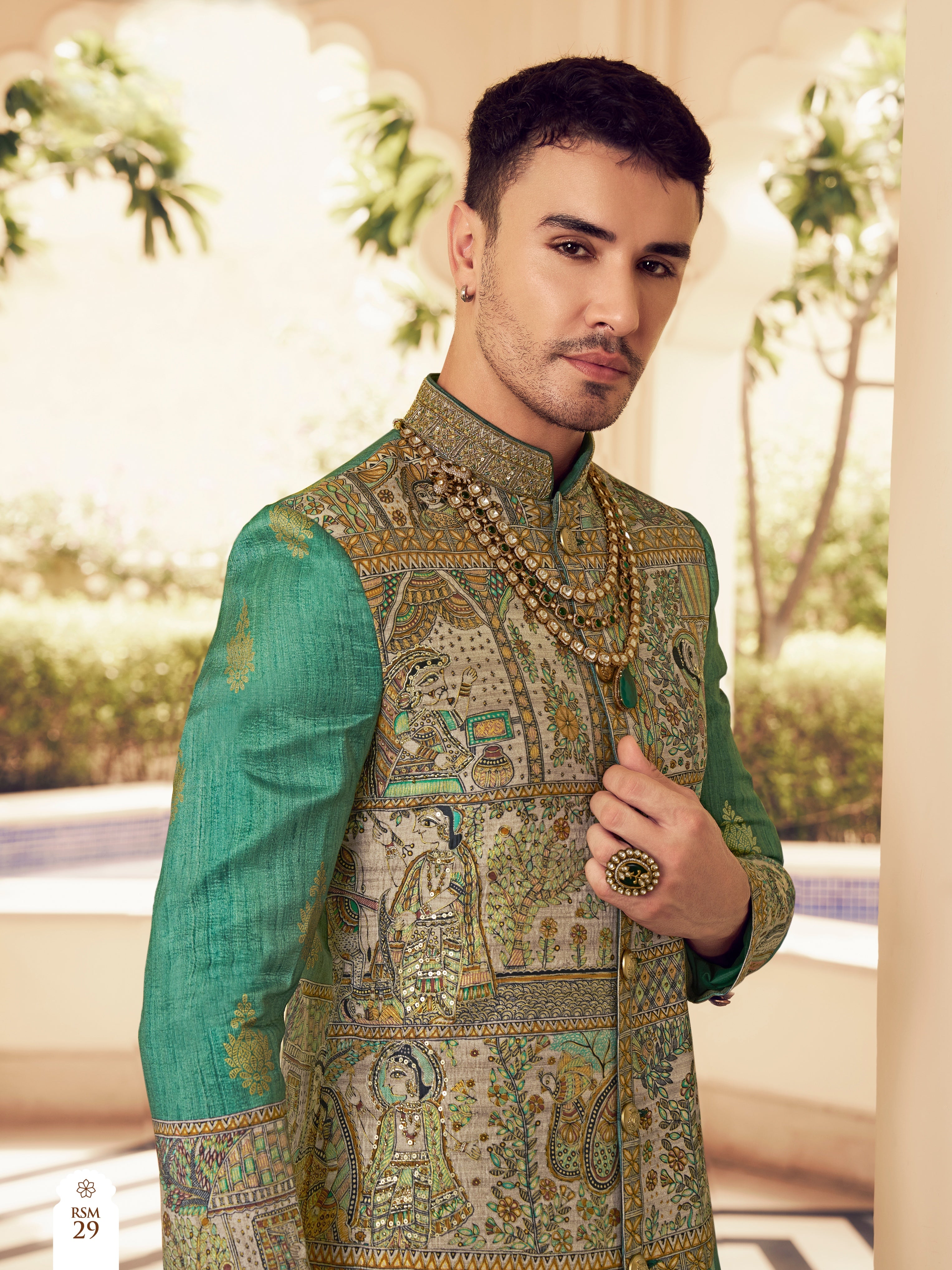 Traditional green outfit with foil print

