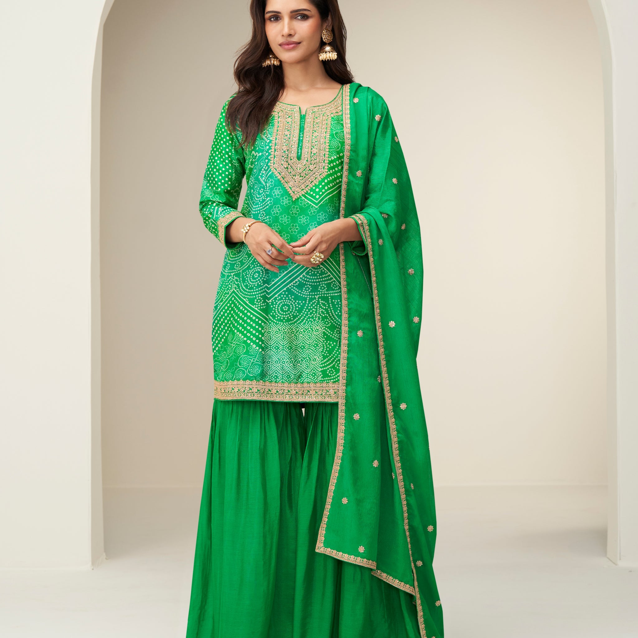 Green chinnon silk sharara suit with embroidered kurti

