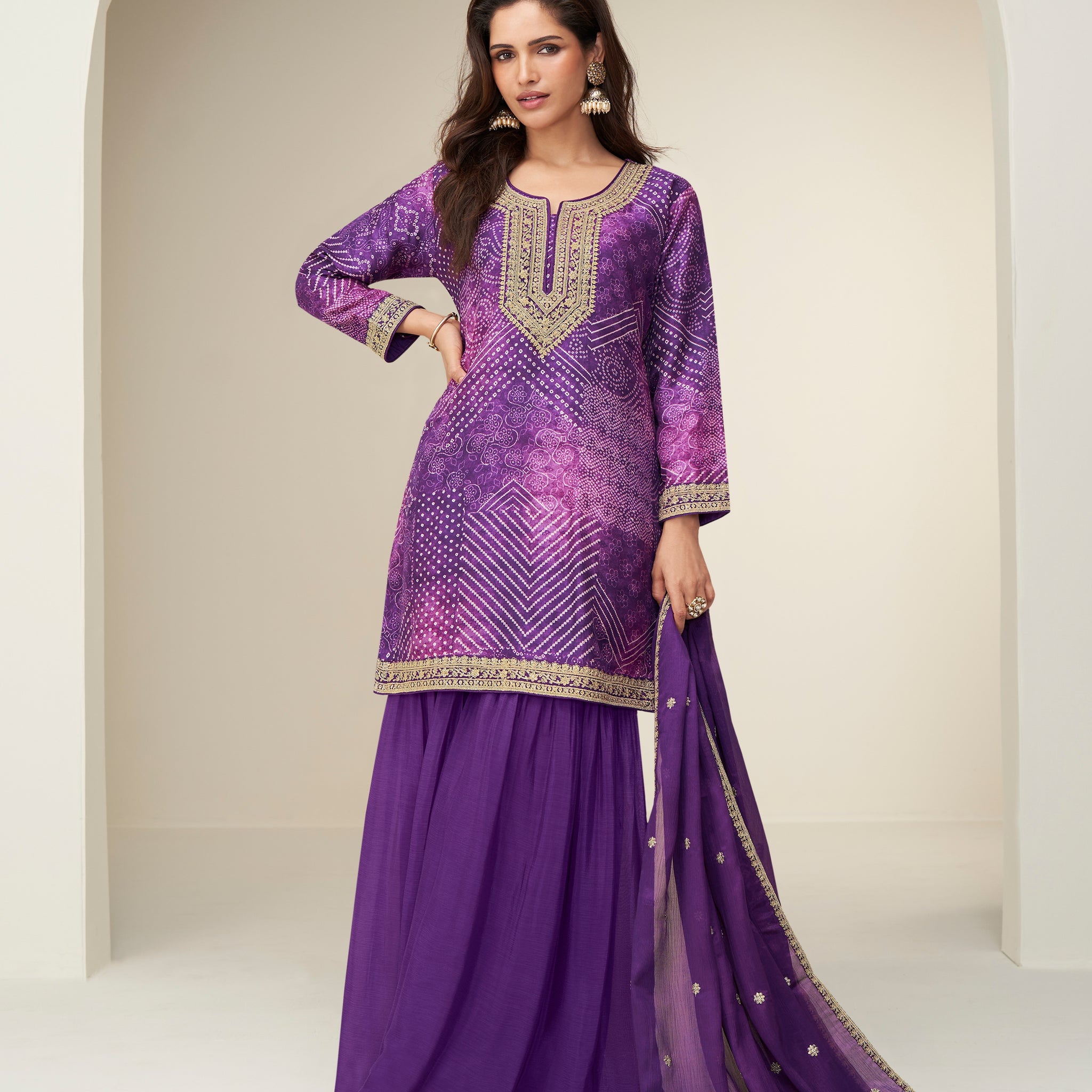 Purple chinnon silk sharara suit with mirror neckline

