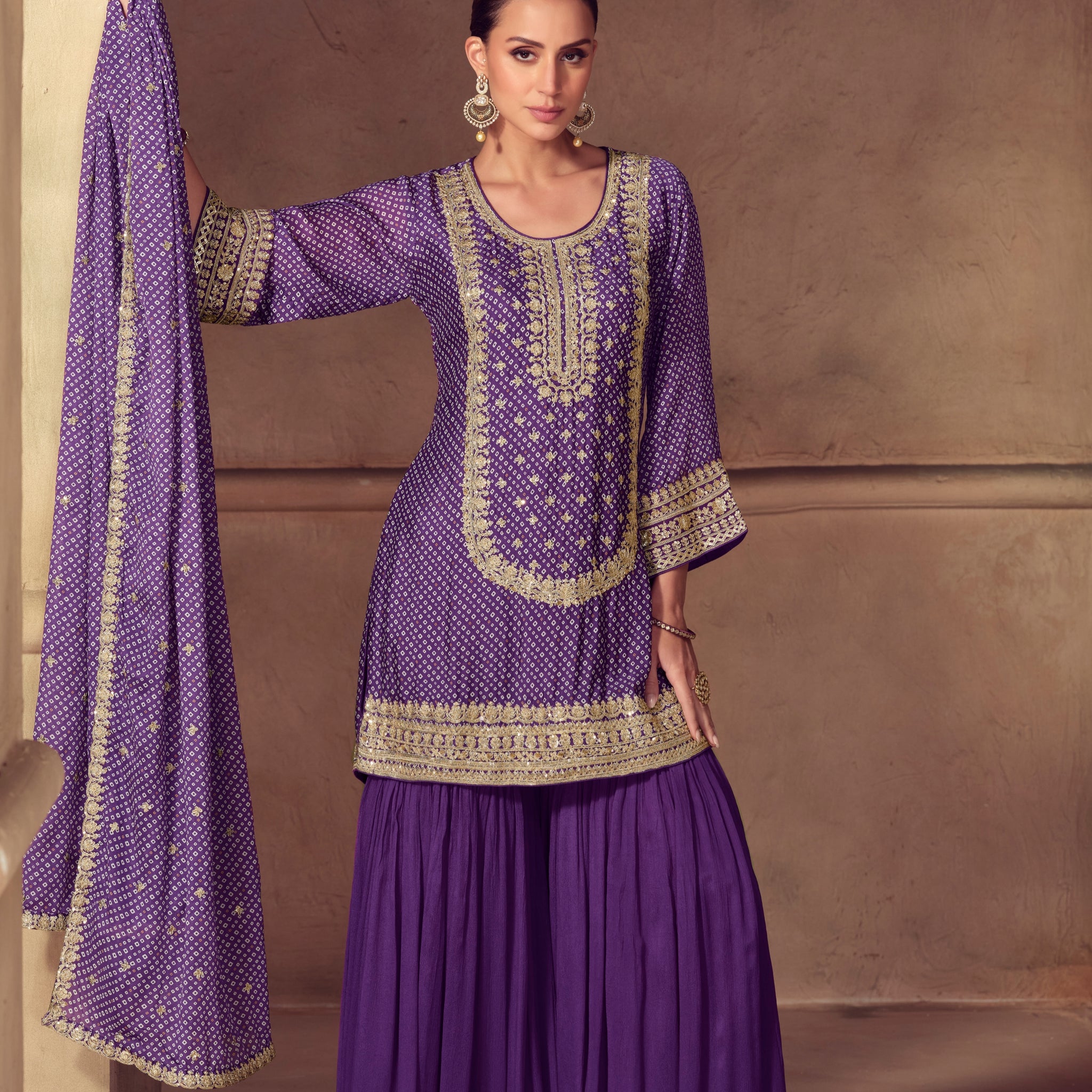 Purple chinon sharara suit with heavy embroidery

