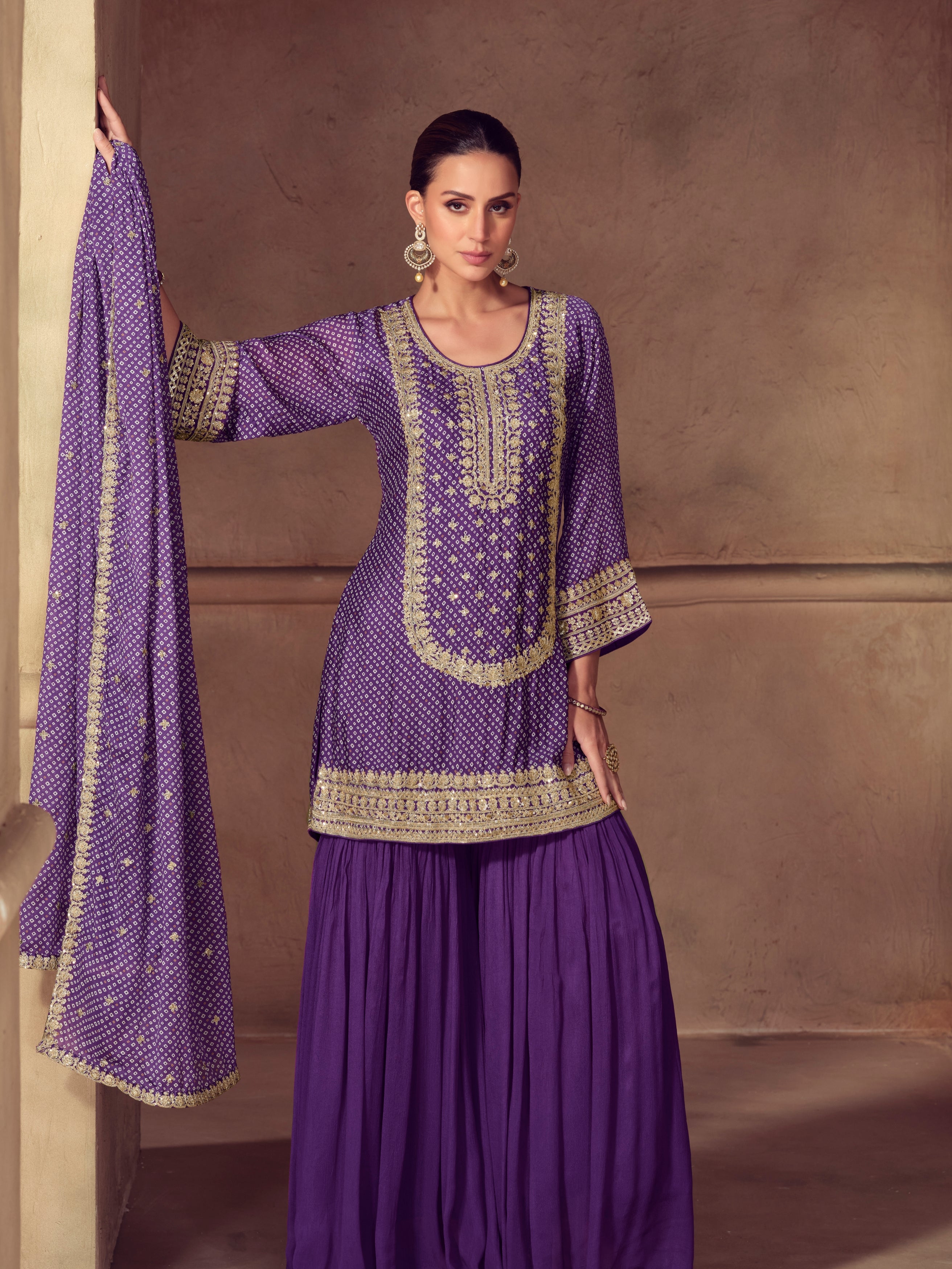 Purple chinon sharara suit with heavy embroidery

