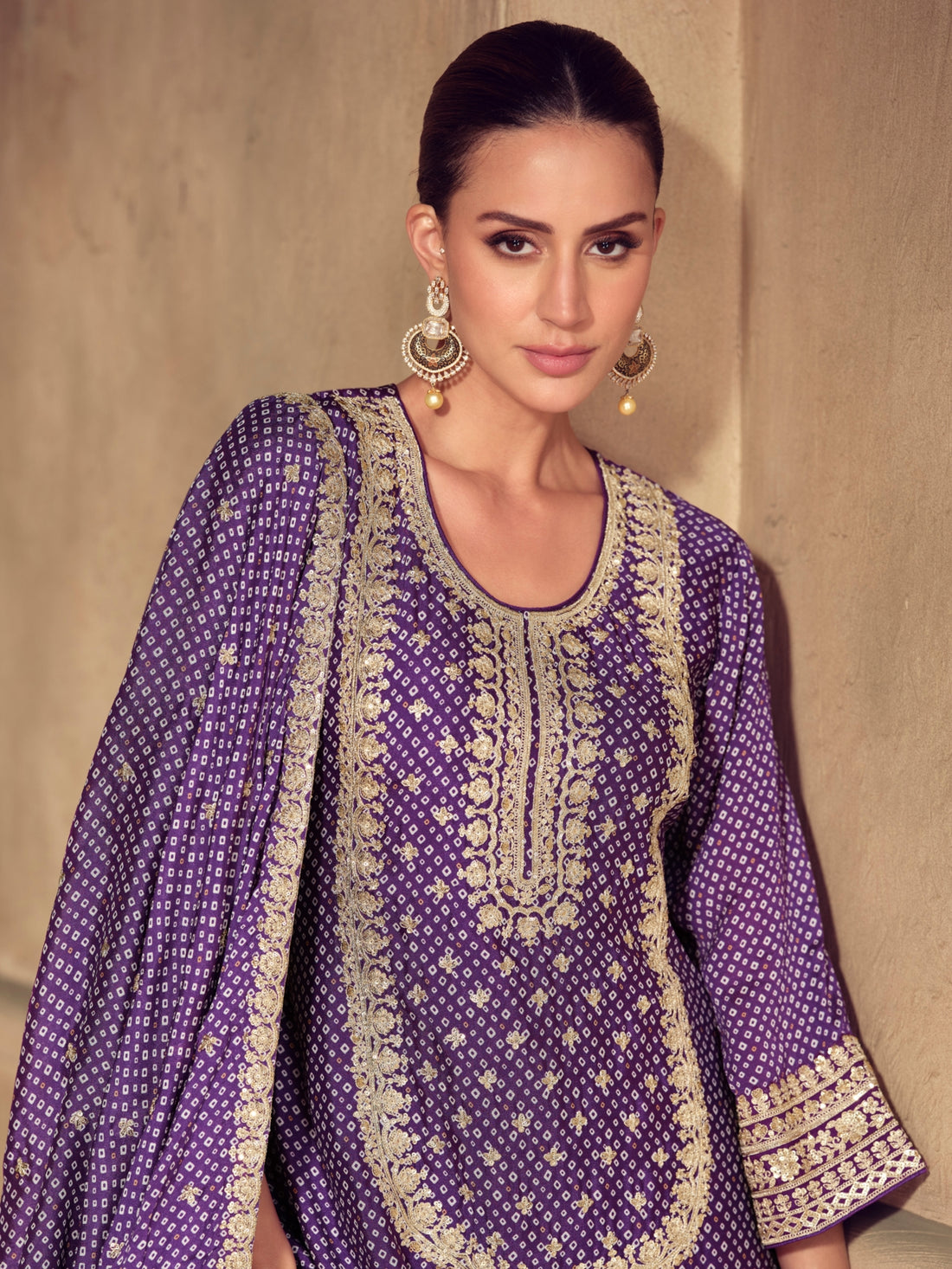 Purple chinon sharara suit with heavy embroidery

