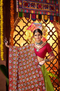 Bright green Navratri dance ensemble

