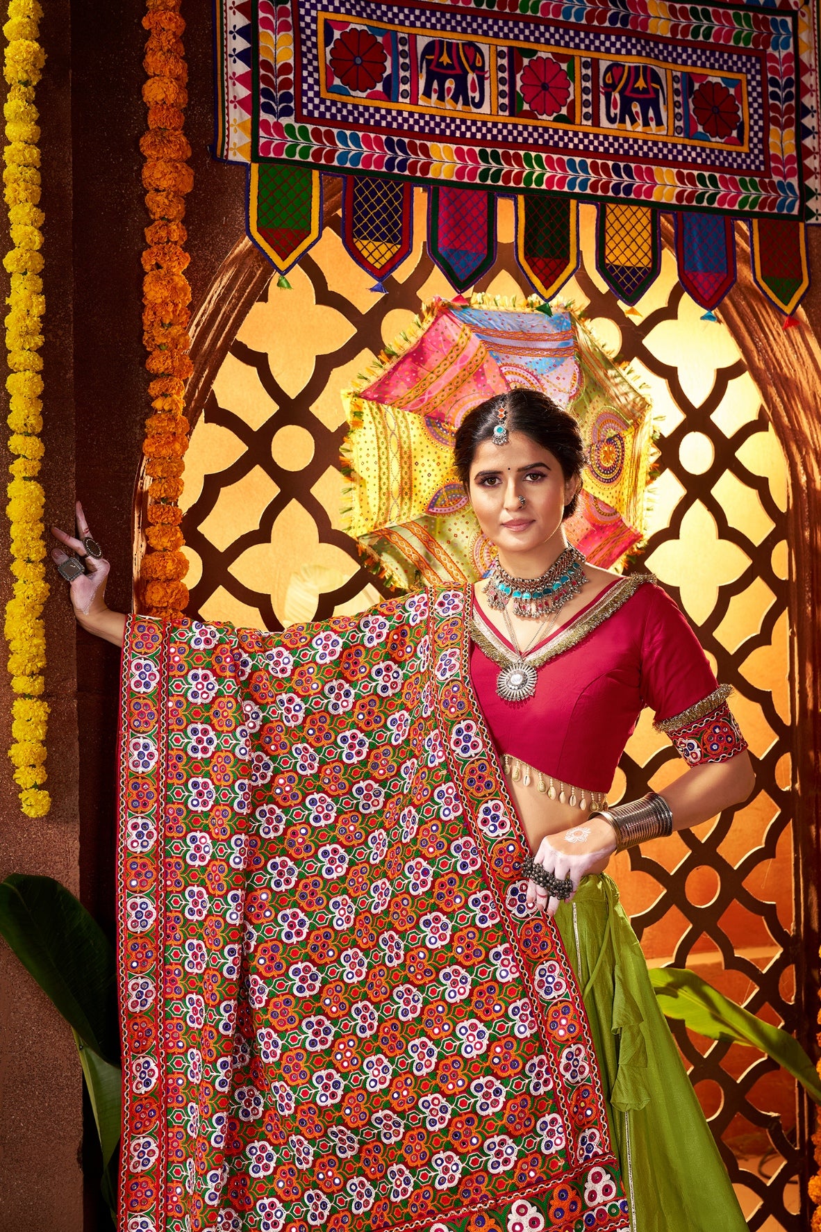 Bright green Navratri dance ensemble

