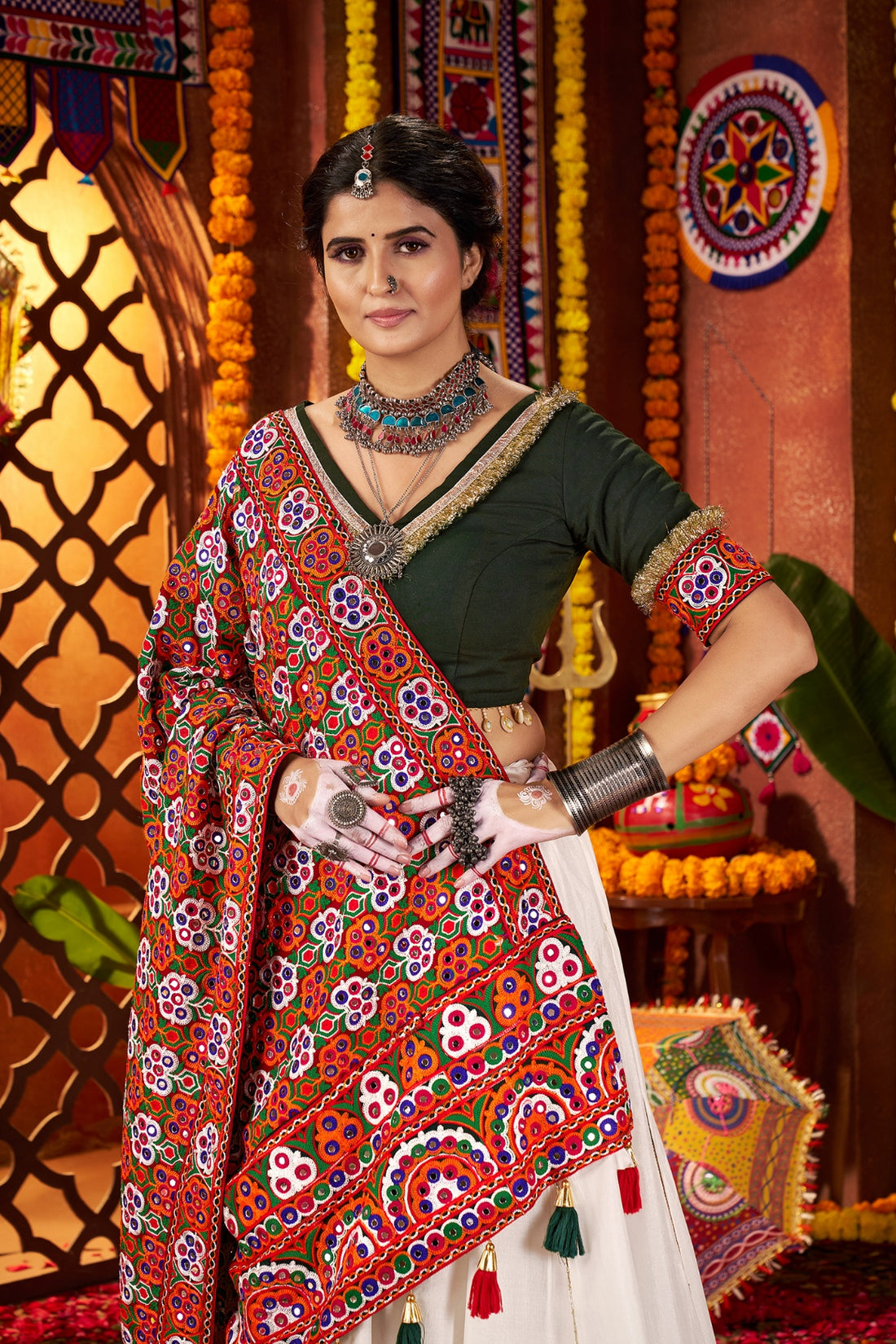 White silk chaniya choli with red mirror dupatta

