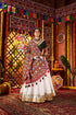 White silk chaniya choli with red mirror dupatta

