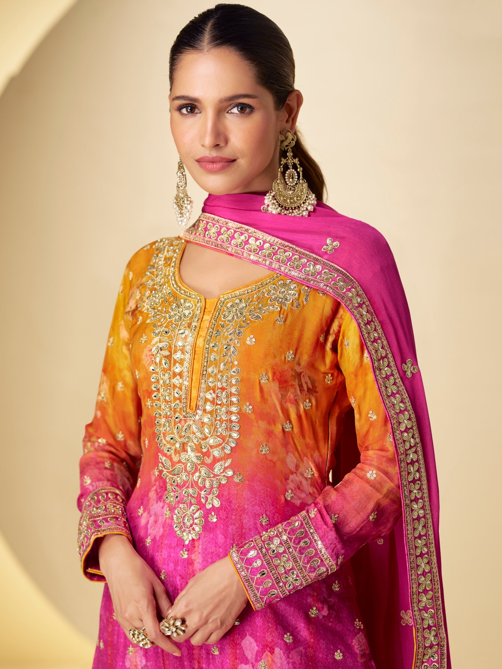 Close-up embroidery view on chinon pink-orange sharara top

