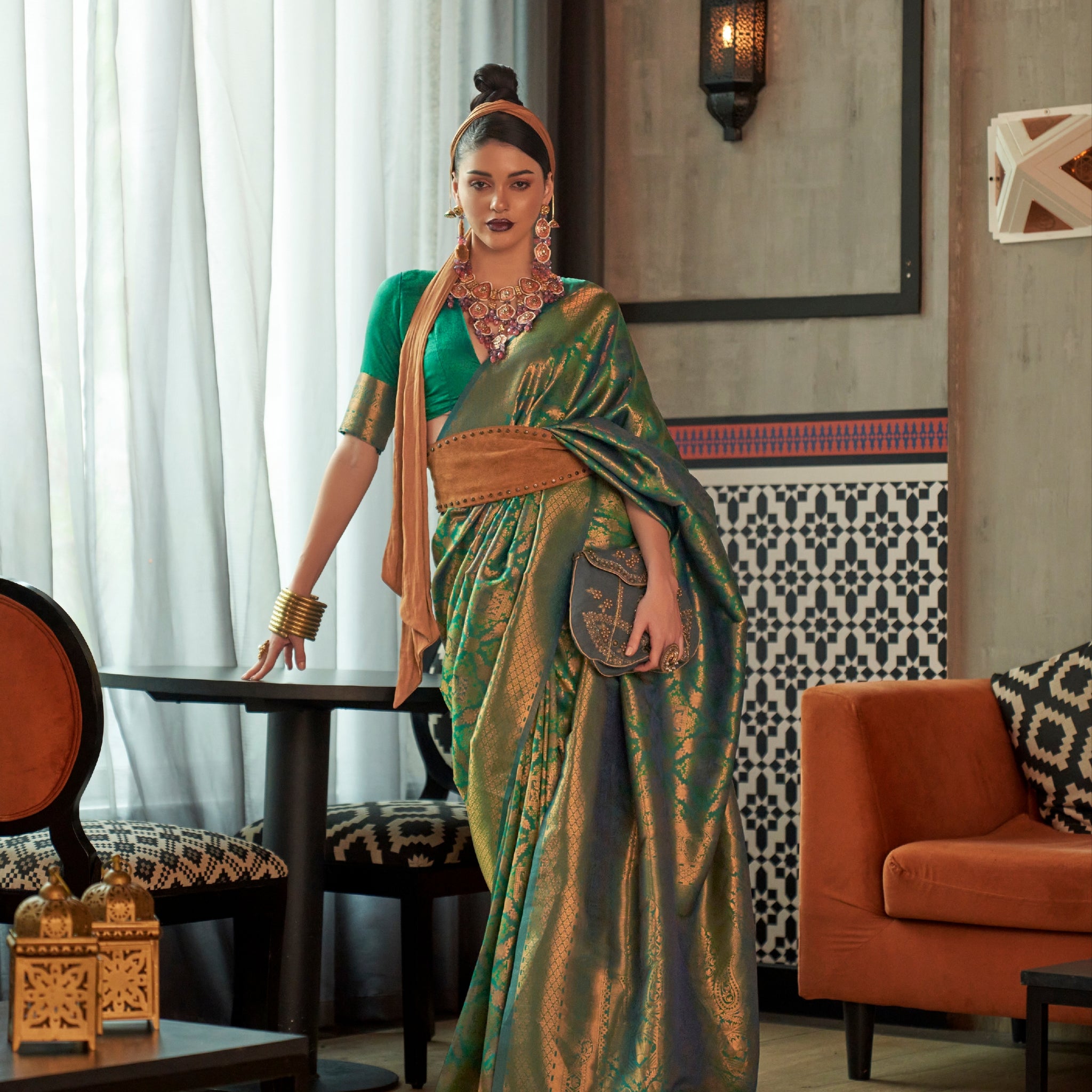 Green two tone handloom silk saree with golden zari work