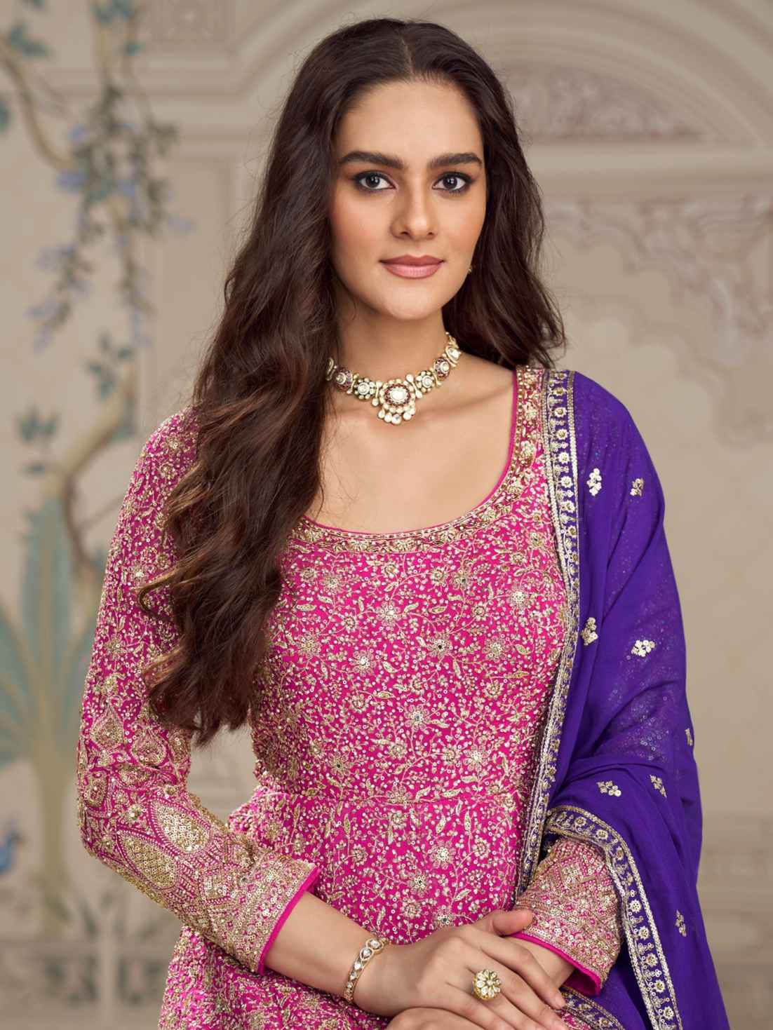 Heavy embroidered pink gown with Zarkan work