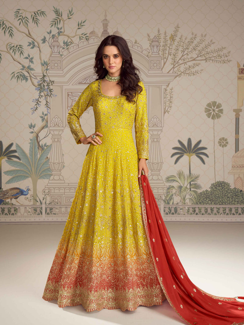 Yellow Anarkali gown with red embroidered dupatta