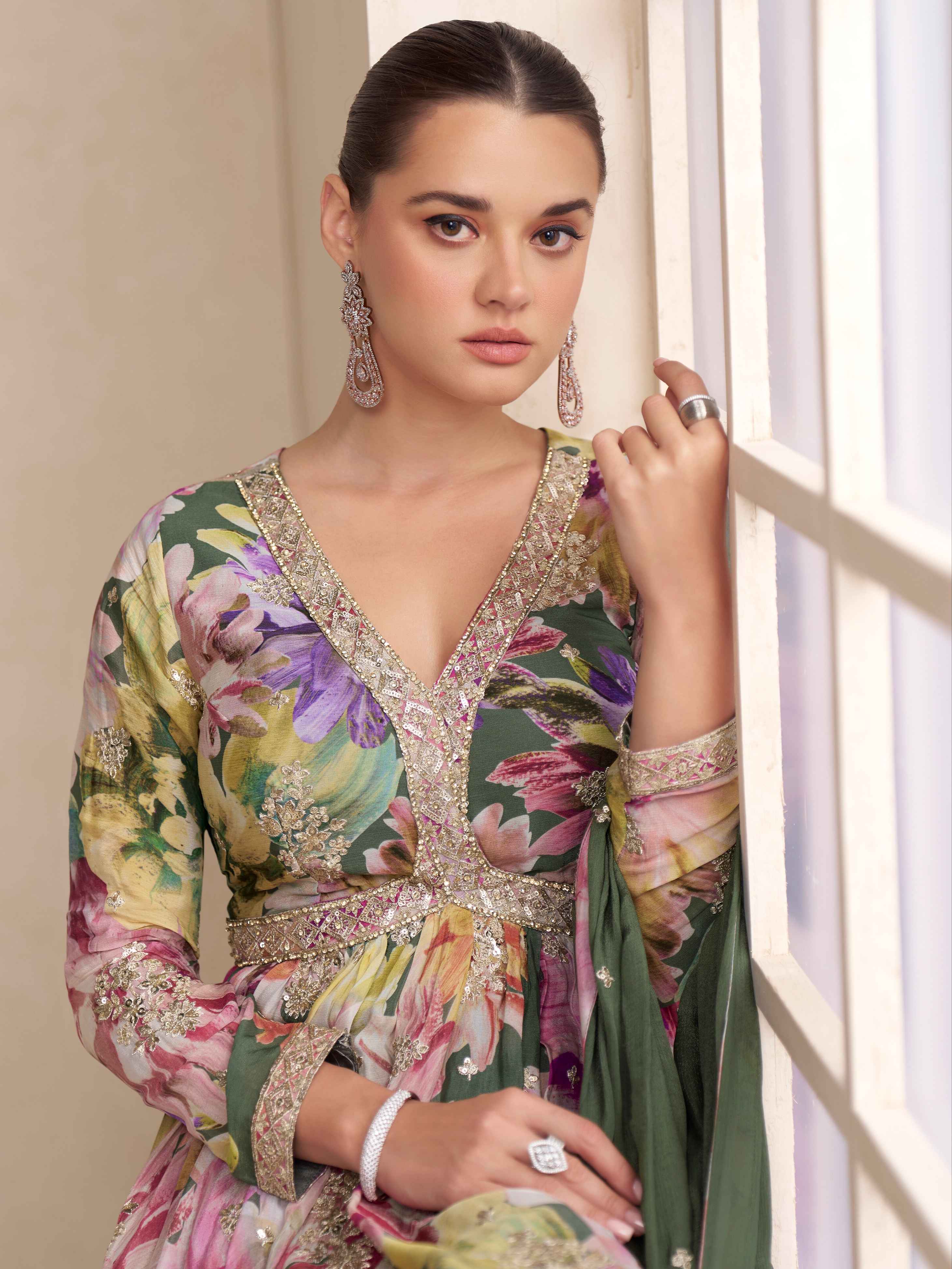 Heavy embroidered green palazzo set for festive wear