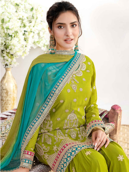 Green Heavy Embroidered Chinnon Sharara Suit with Dual Shade Dupatta Sharara Suit Anant Tex Exports Pvt.Ltd..