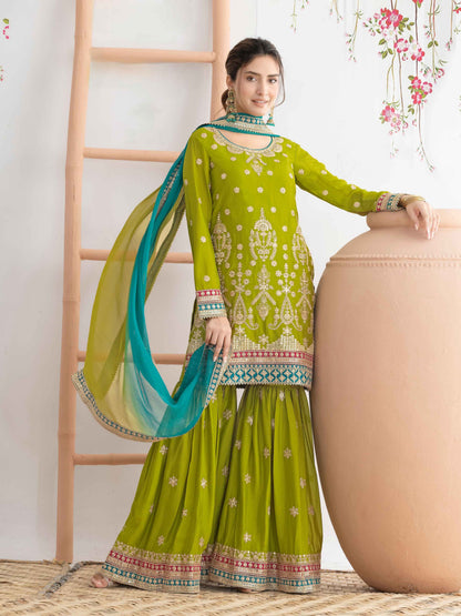 Green Heavy Embroidered Chinnon Sharara Suit with Dual Shade Dupatta Sharara Suit Anant Tex Exports Pvt.Ltd..
