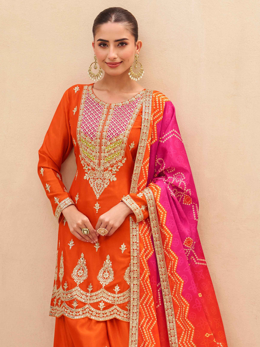 Orange Embroidered Premium Chinnon Silk Palazzo Suit Palazzo Suit Anant Tex Exports Pvt.Ltd..