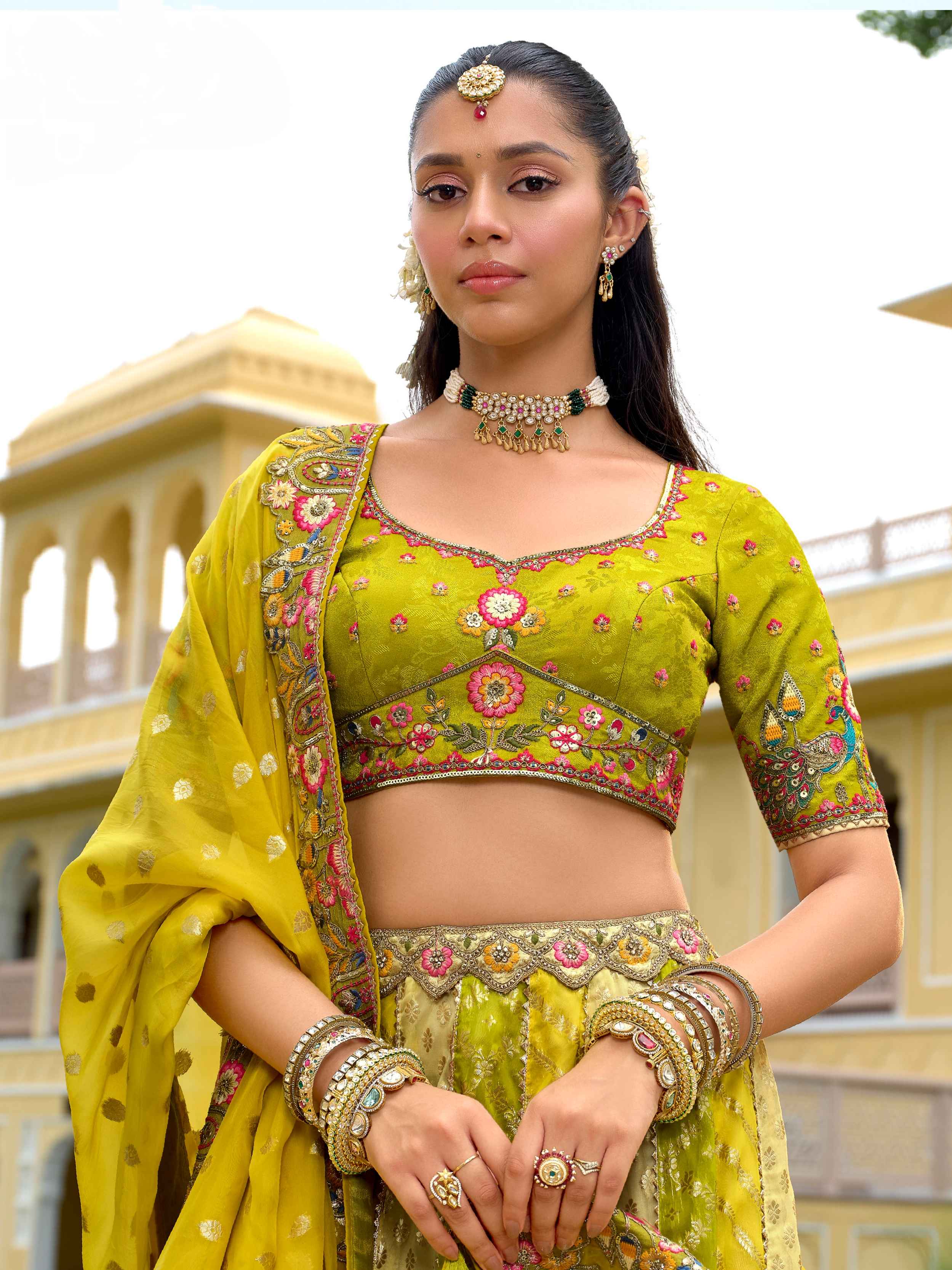 Lime Yellow Heavy Embroidered Silk Lehenga with Designer Net Dupatta
