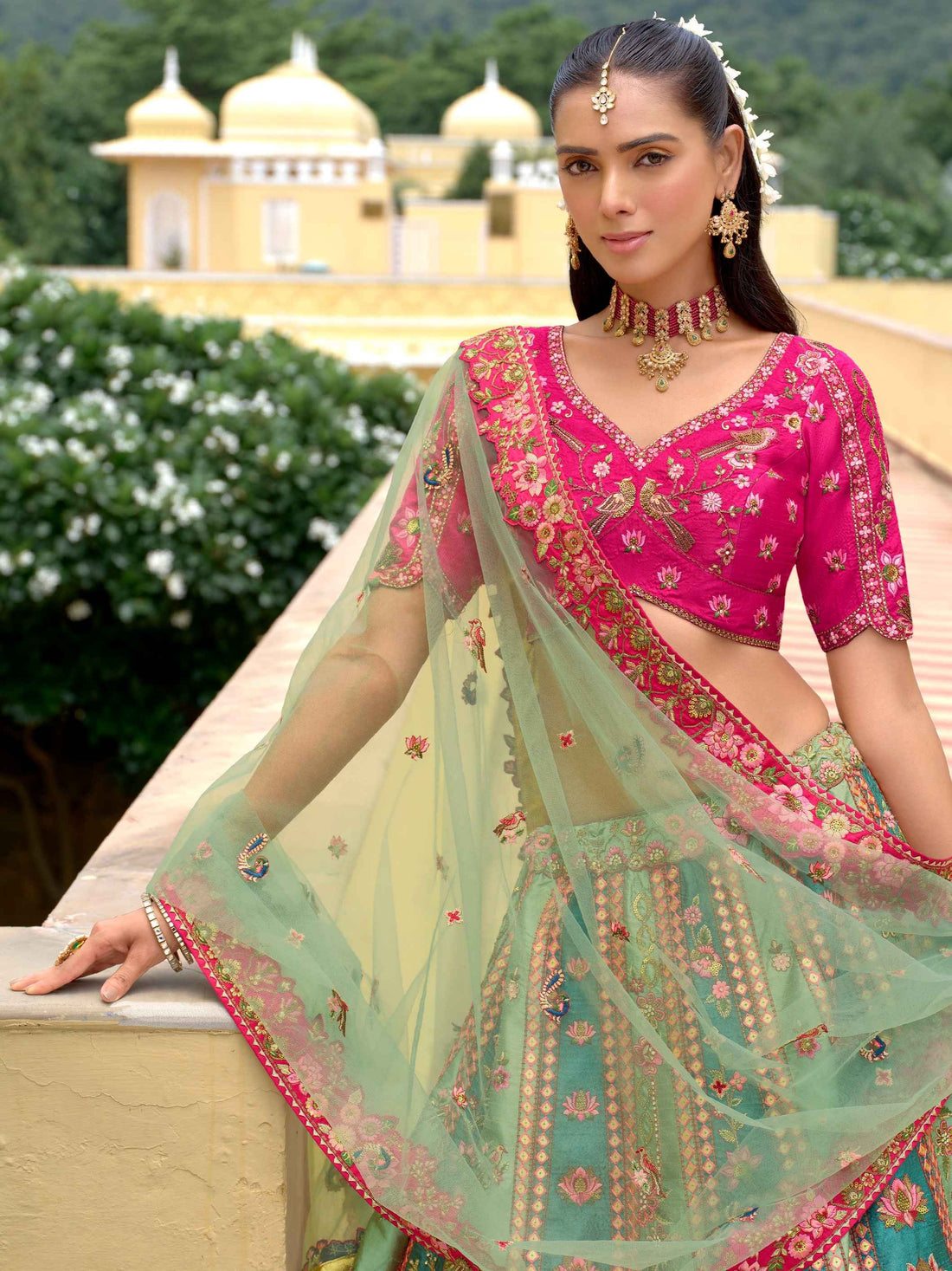 Green Multi-Panel Silk Embroidered Lehenga with Pink Accents Silk Lehenga Anant Tex Exports Pvt.Ltd..