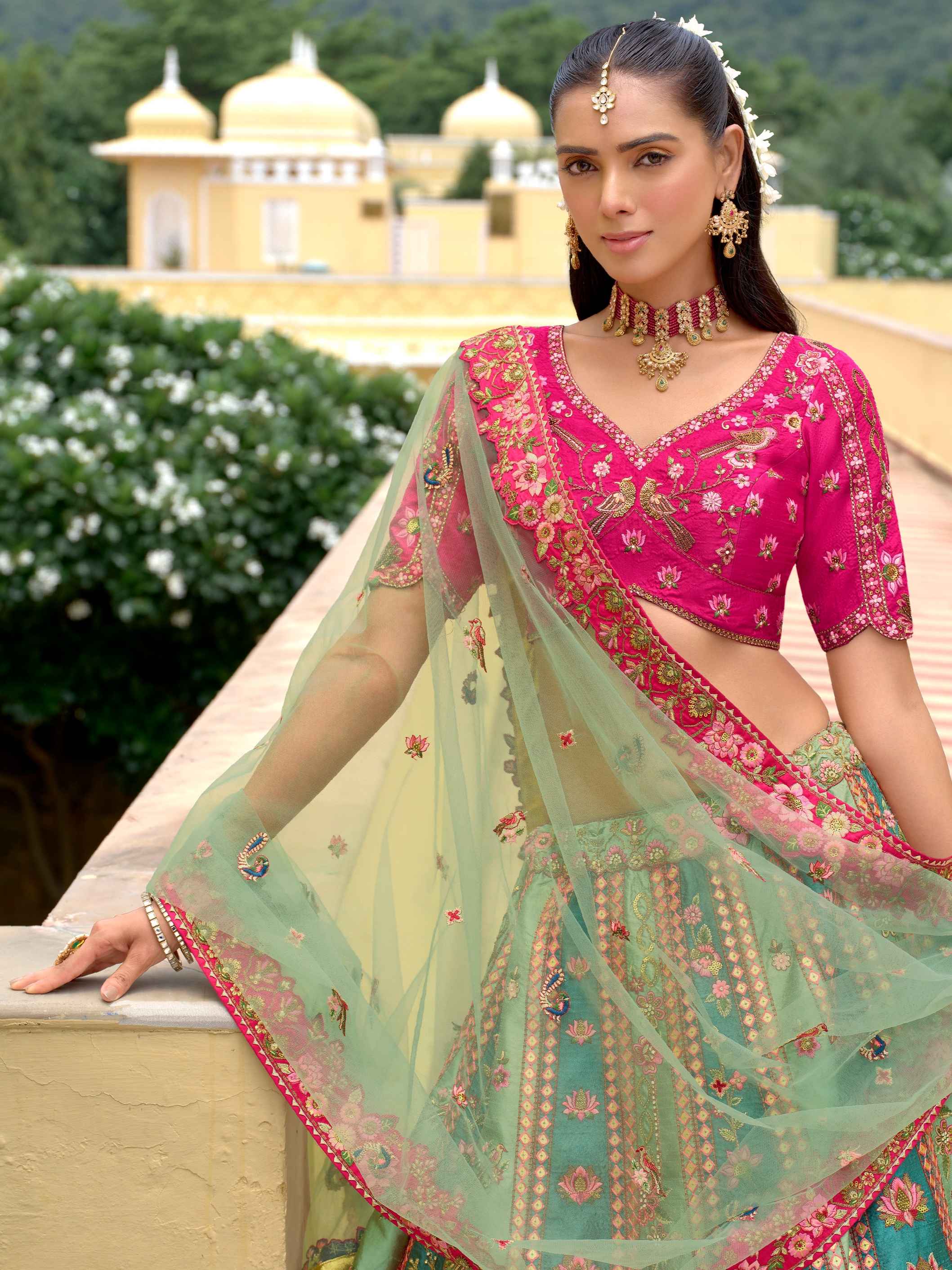Green Multi-Panel Silk Embroidered Lehenga with Pink Accents