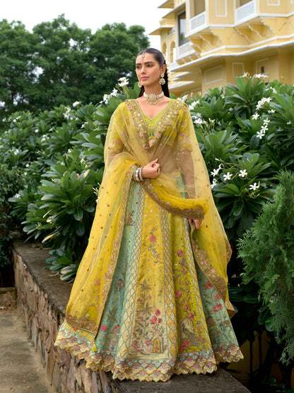 Mustard Yellow Silk Floral Embroidery Lehenga with Net Dupatta Silk Lehenga Anant Tex Exports Pvt.Ltd..