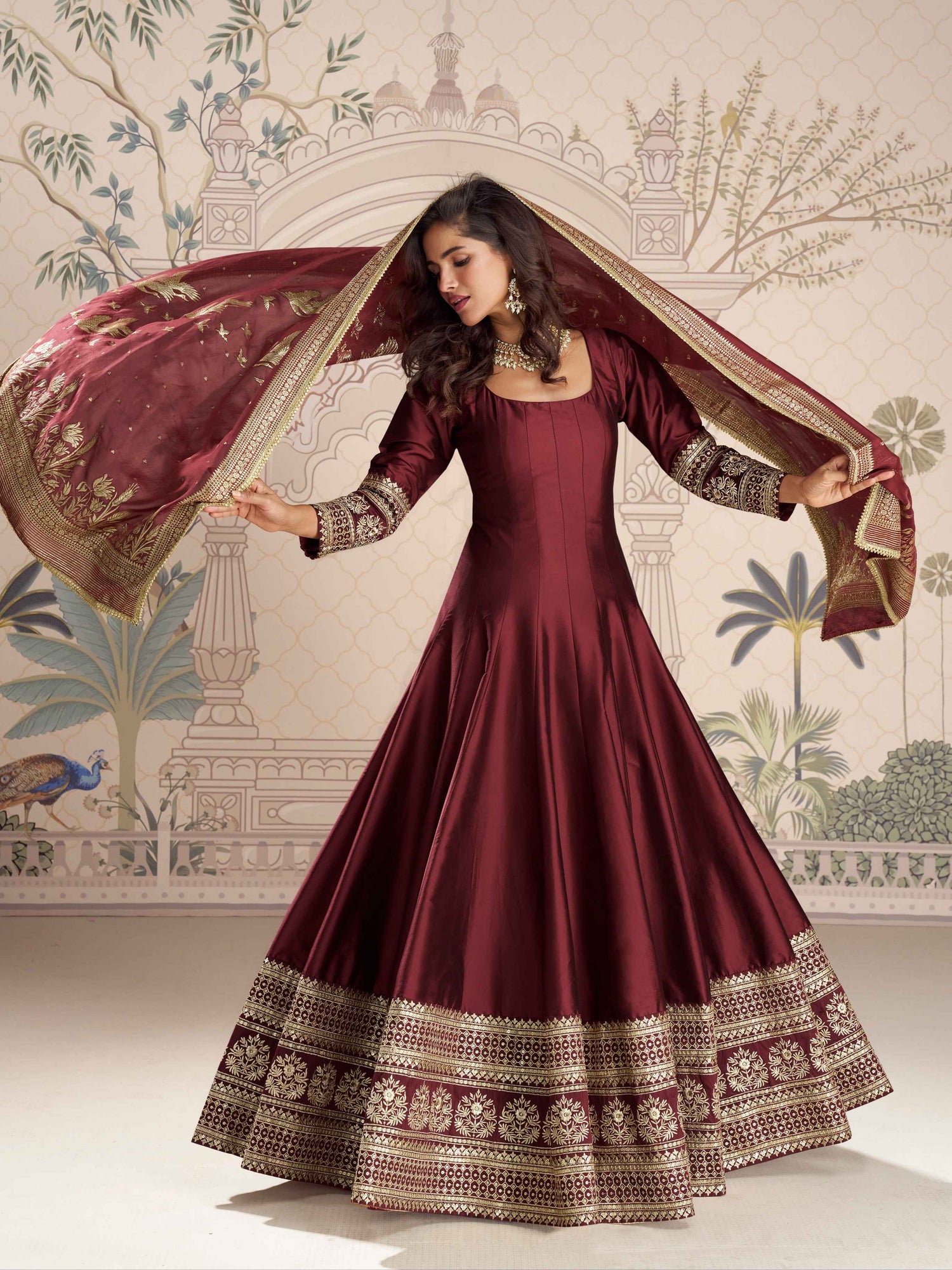 Maroon Silk Anarkali Gown with Embroidered Border Anarkali Gown Anant Tex Exports Pvt.Ltd..