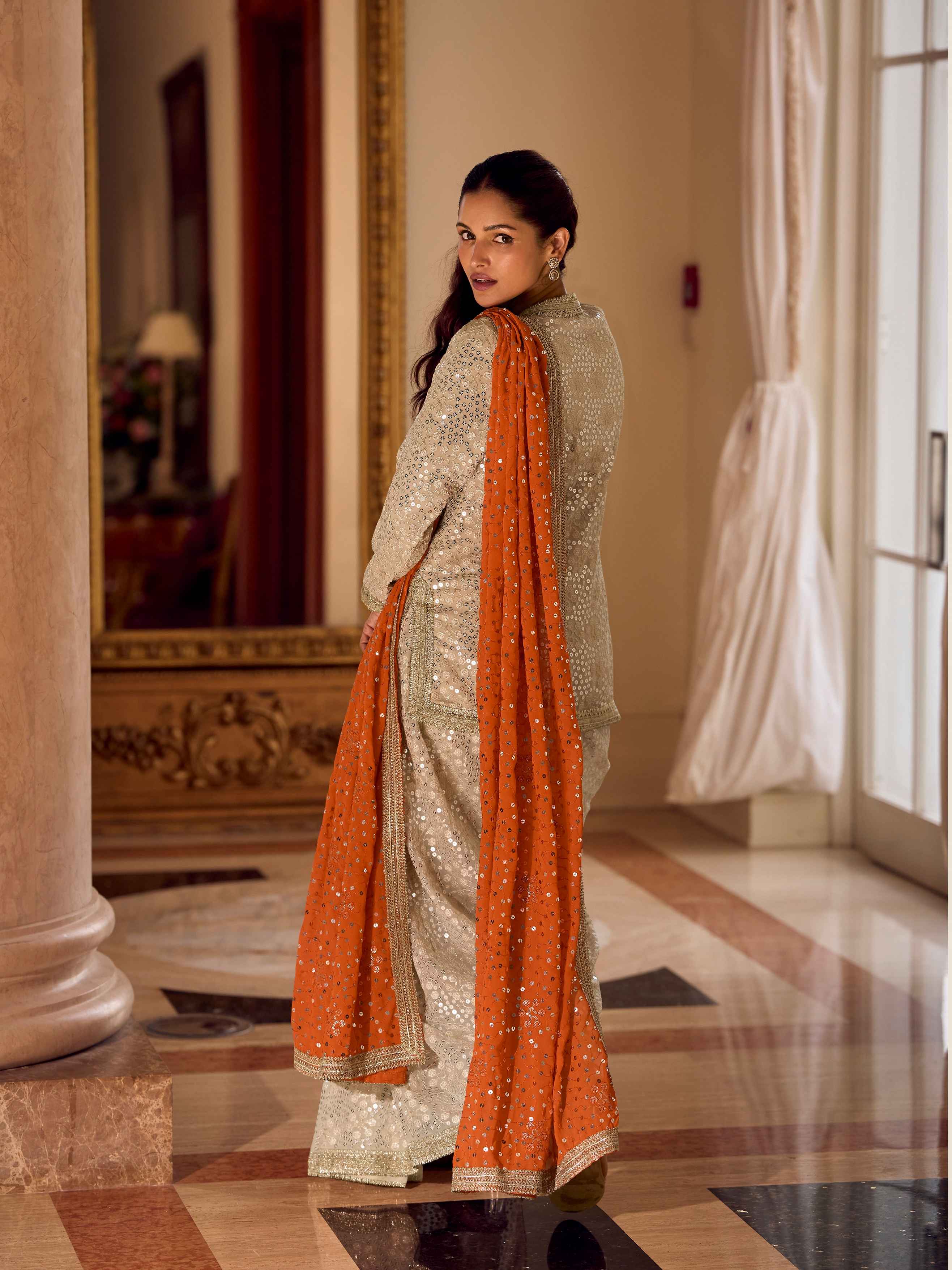 Champagne Gold Hand-Embroidered Dhoti Set with Orange Dupatta Dhoti Suit Anant Tex Exports Pvt.Ltd..