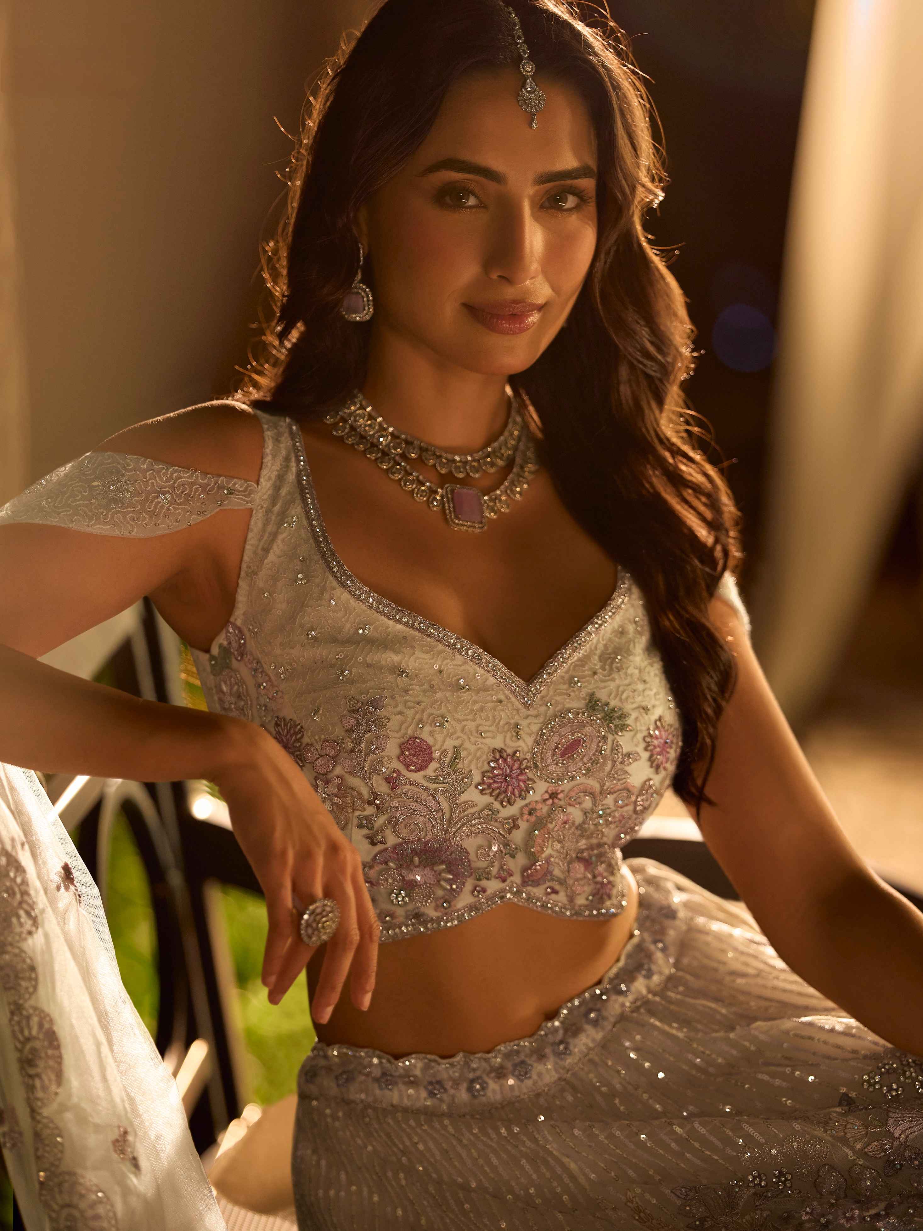 Pearl White Heavy Hand Embroidered Net Lehenga