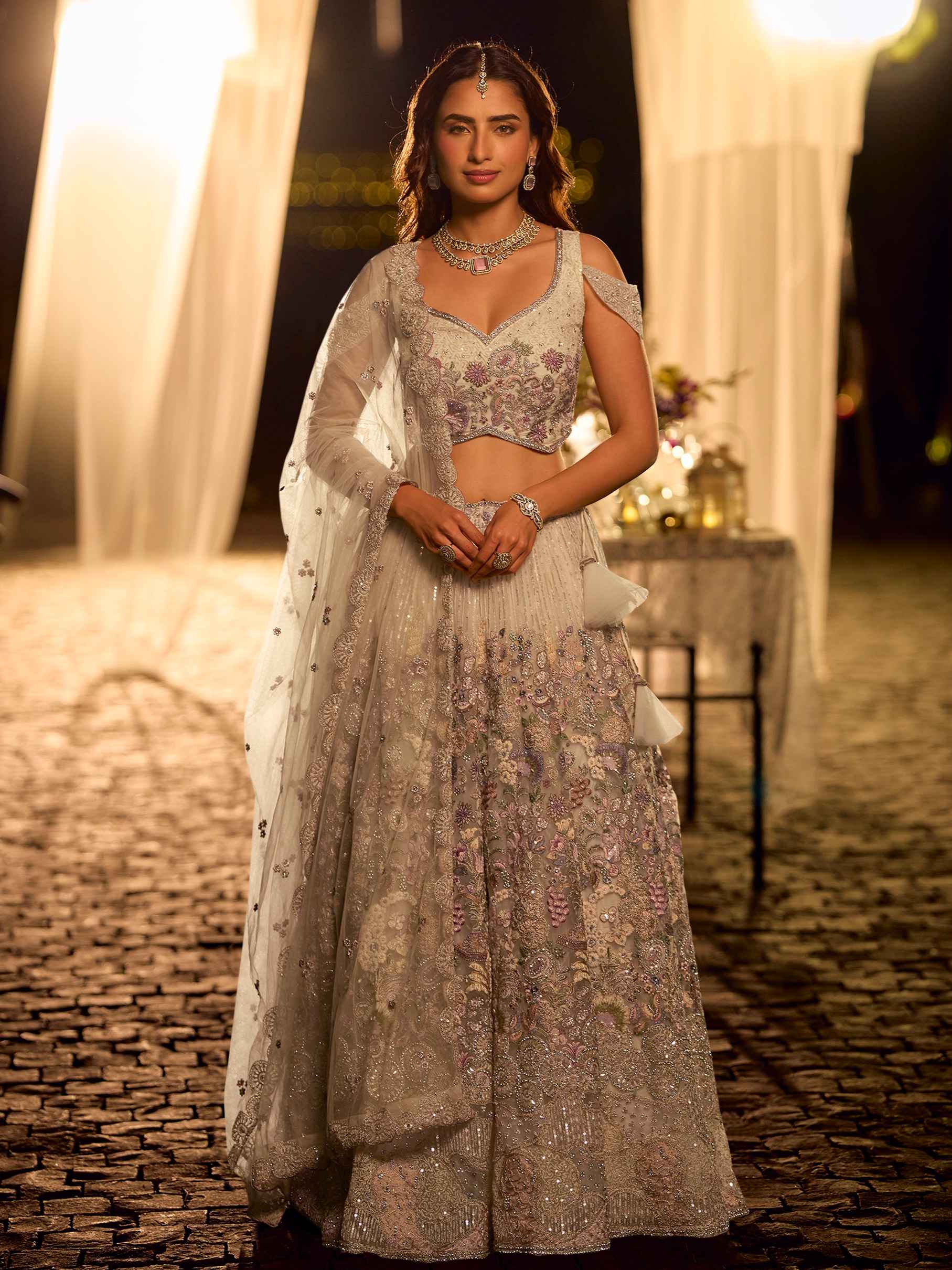 Pearl White Heavy Hand Embroidered Net Lehenga