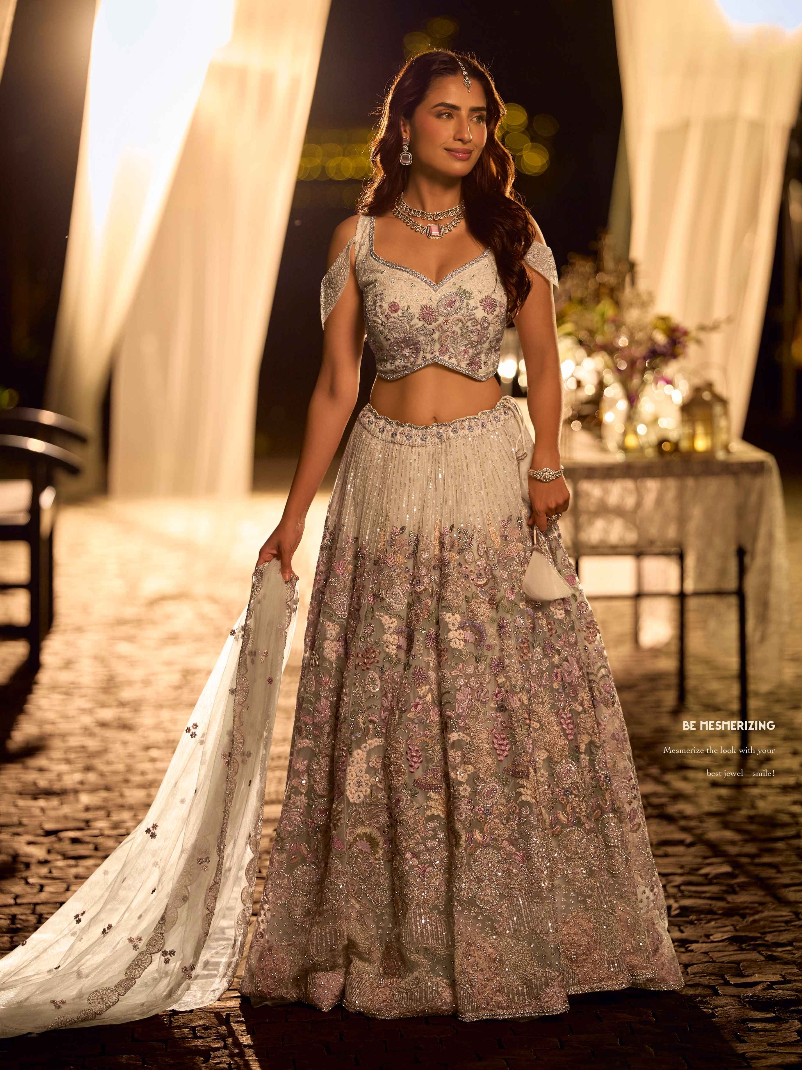 Pearl White Heavy Hand Embroidered Net Lehenga