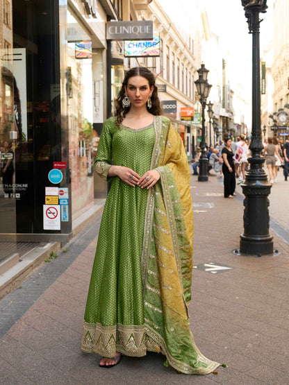 Olive Green Heavy Jacquard Silk Gown with Digital Embroidered Dupatta Gown Anant Tex Exports Pvt.Ltd..