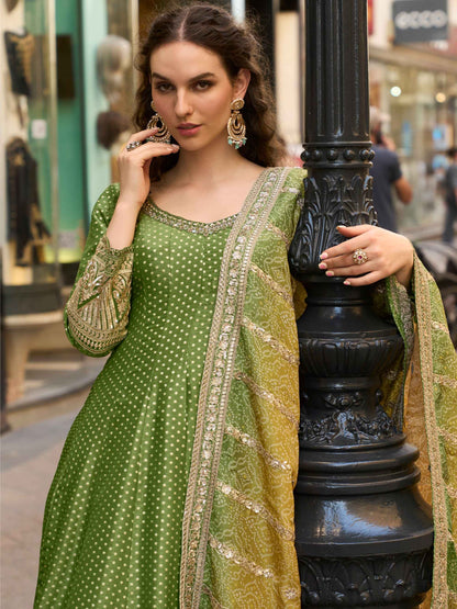 Olive Green Heavy Jacquard Silk Gown with Digital Embroidered Dupatta Gown Anant Tex Exports Pvt.Ltd..