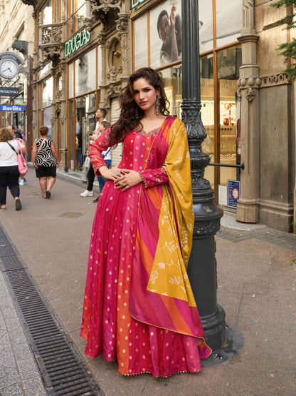 Magenta Pink Viscose Jacquard Silk Gown with Embroidered Chinon Dupatta Gown Anant Tex Exports Pvt.Ltd..