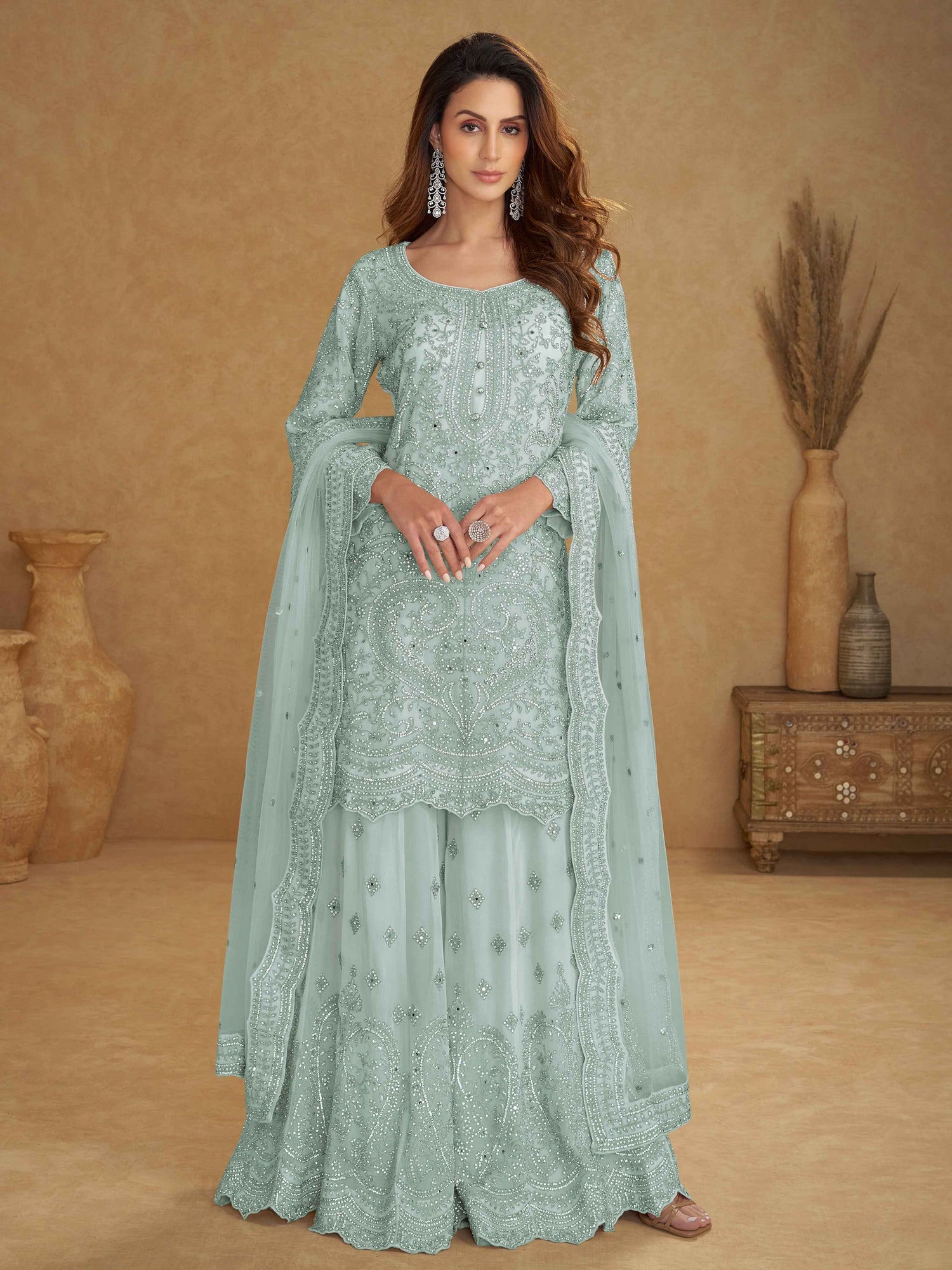 Mint Green Real Net Embroidered Palazzo Suit with Hand Work Palazzo Suit Anant Tex Exports Pvt.Ltd..