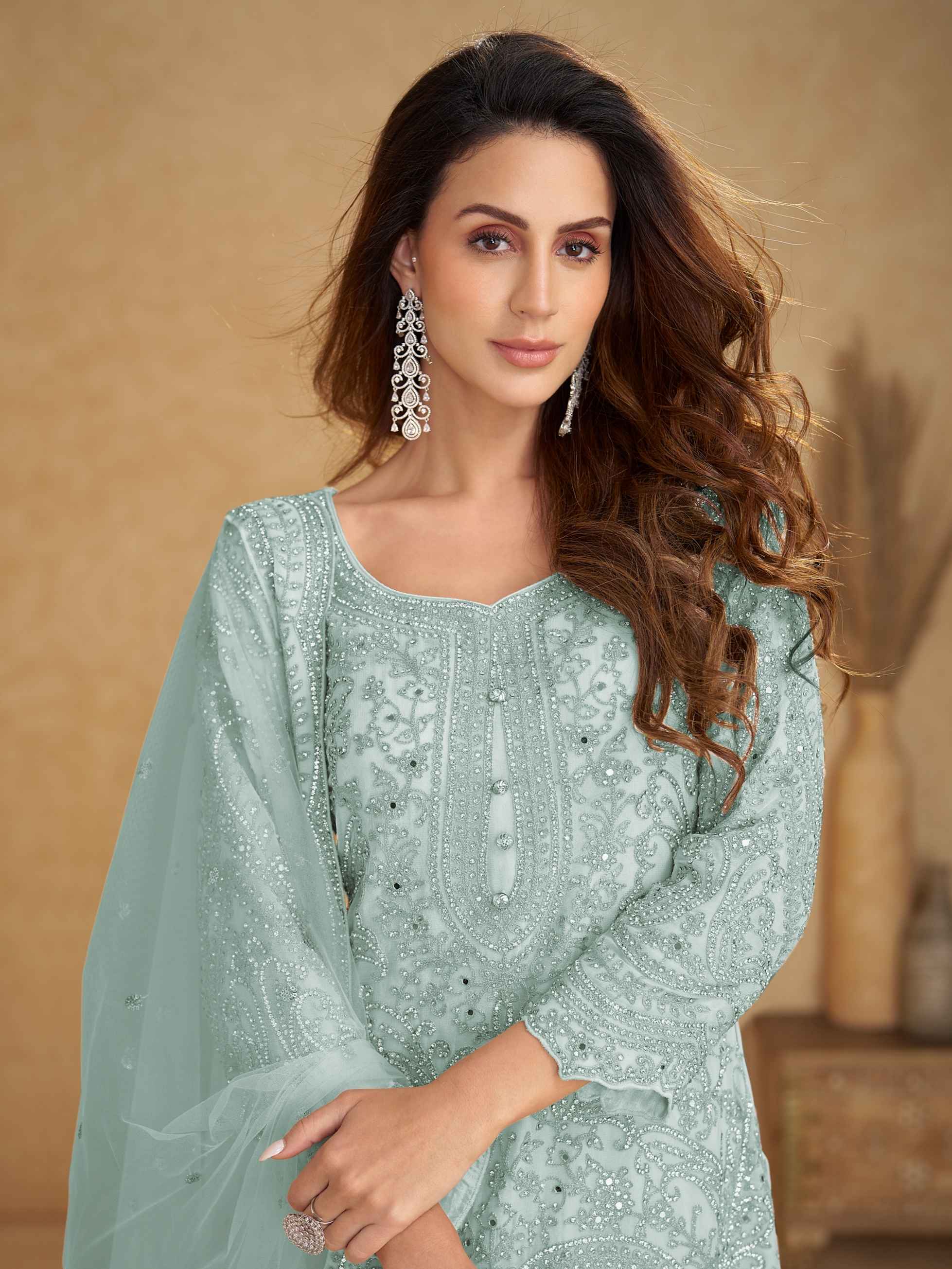 Mint Green Real Net Embroidered Palazzo Suit with Hand Work Palazzo Suit Anant Tex Exports Pvt.Ltd..
