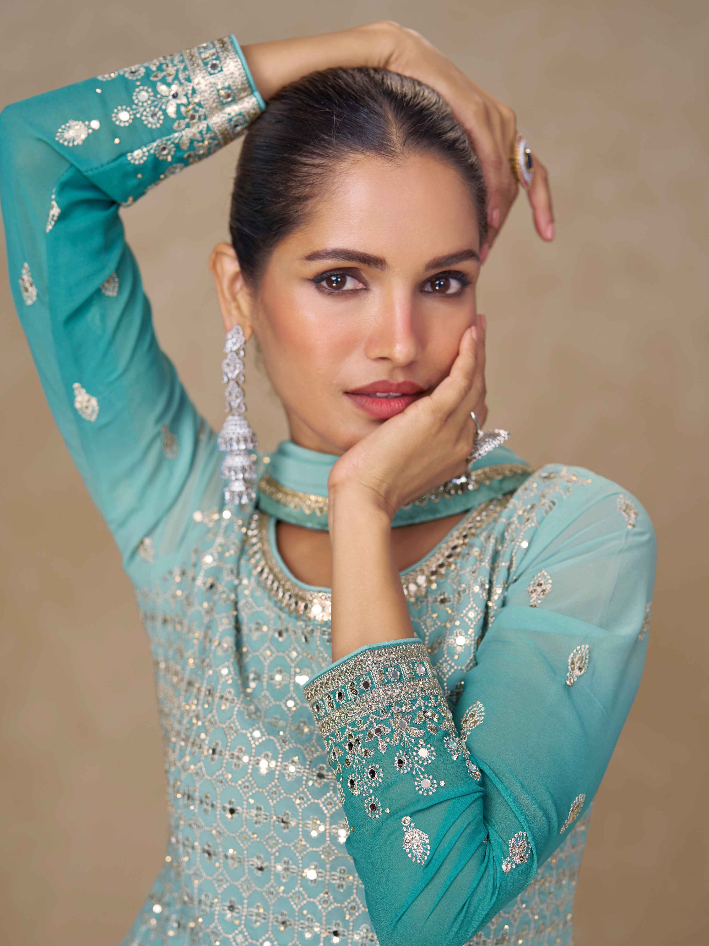 Aqua Blue Embroidered Georgette Palazzo Suit Palazzo Suit Anant Tex Exports Pvt.Ltd..