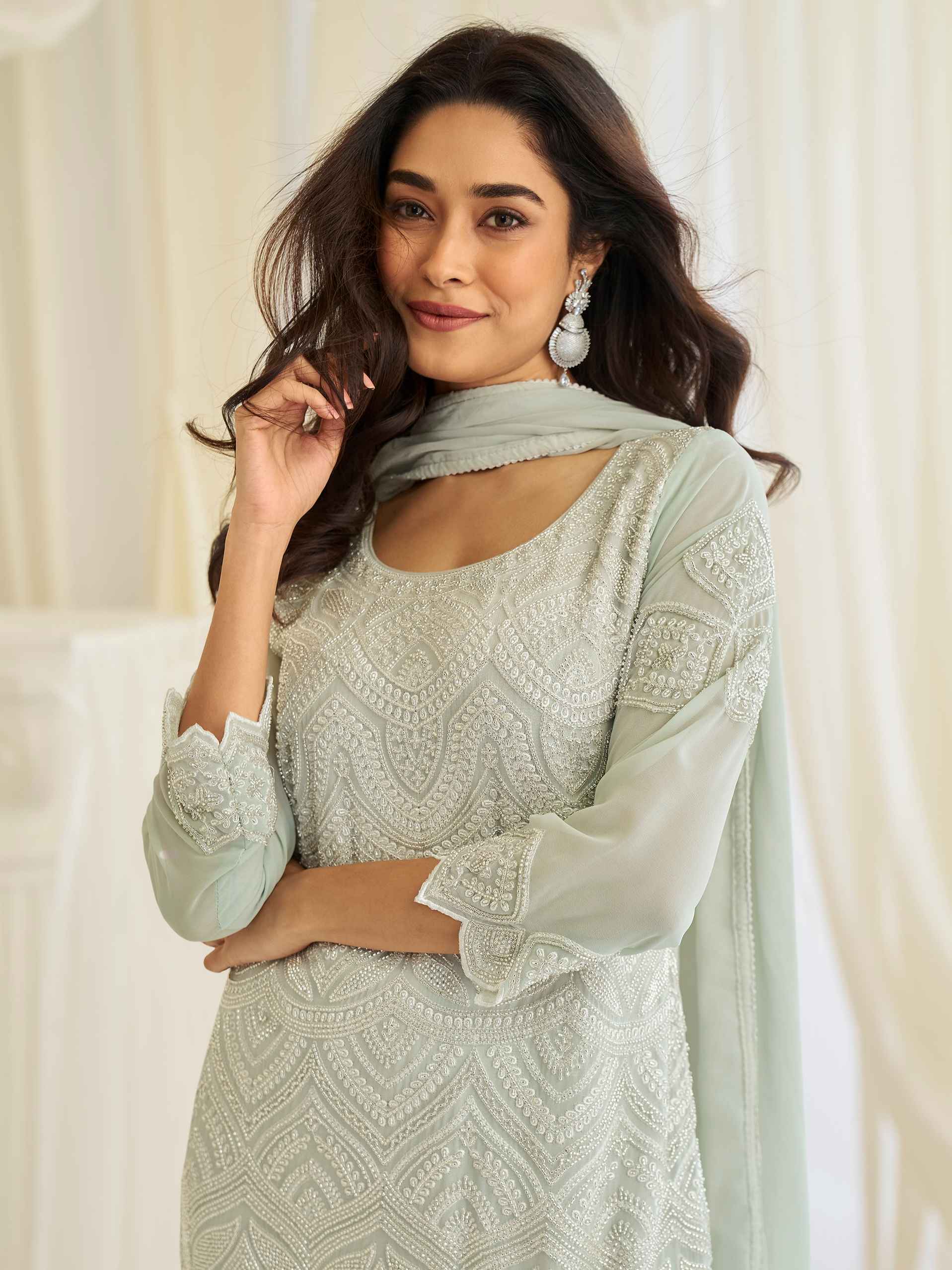 Mint Green Beads Embroidered Georgette Palazzo Suit with Moti Dupatta Palazzo Suit Anant Tex Exports Pvt.Ltd..