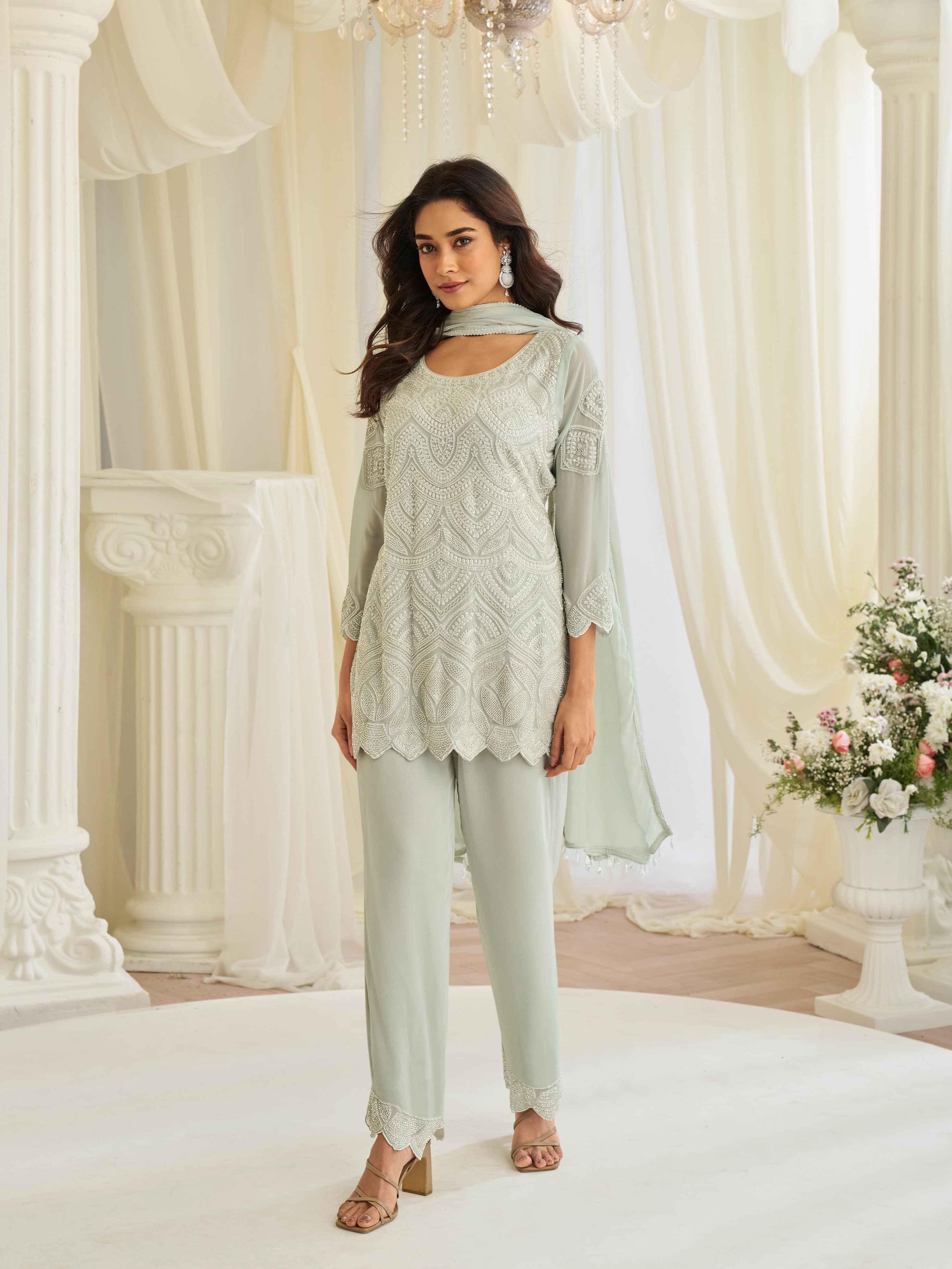 Mint Green Beads Embroidered Georgette Palazzo Suit with Moti Dupatta Palazzo Suit Anant Tex Exports Pvt.Ltd..