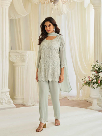 Mint Green Beads Embroidered Georgette Palazzo Suit with Moti Dupatta Palazzo Suit Anant Tex Exports Pvt.Ltd..