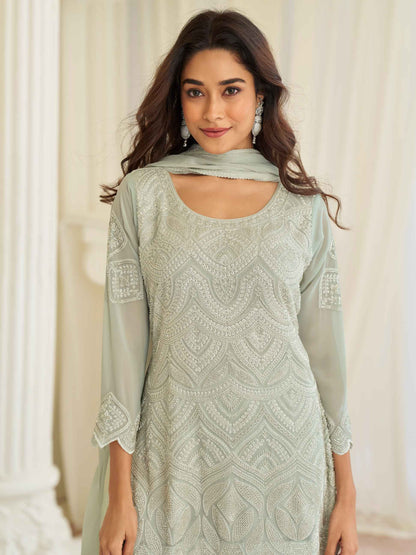 Mint Green Beads Embroidered Georgette Palazzo Suit with Moti Dupatta Palazzo Suit Anant Tex Exports Pvt.Ltd..