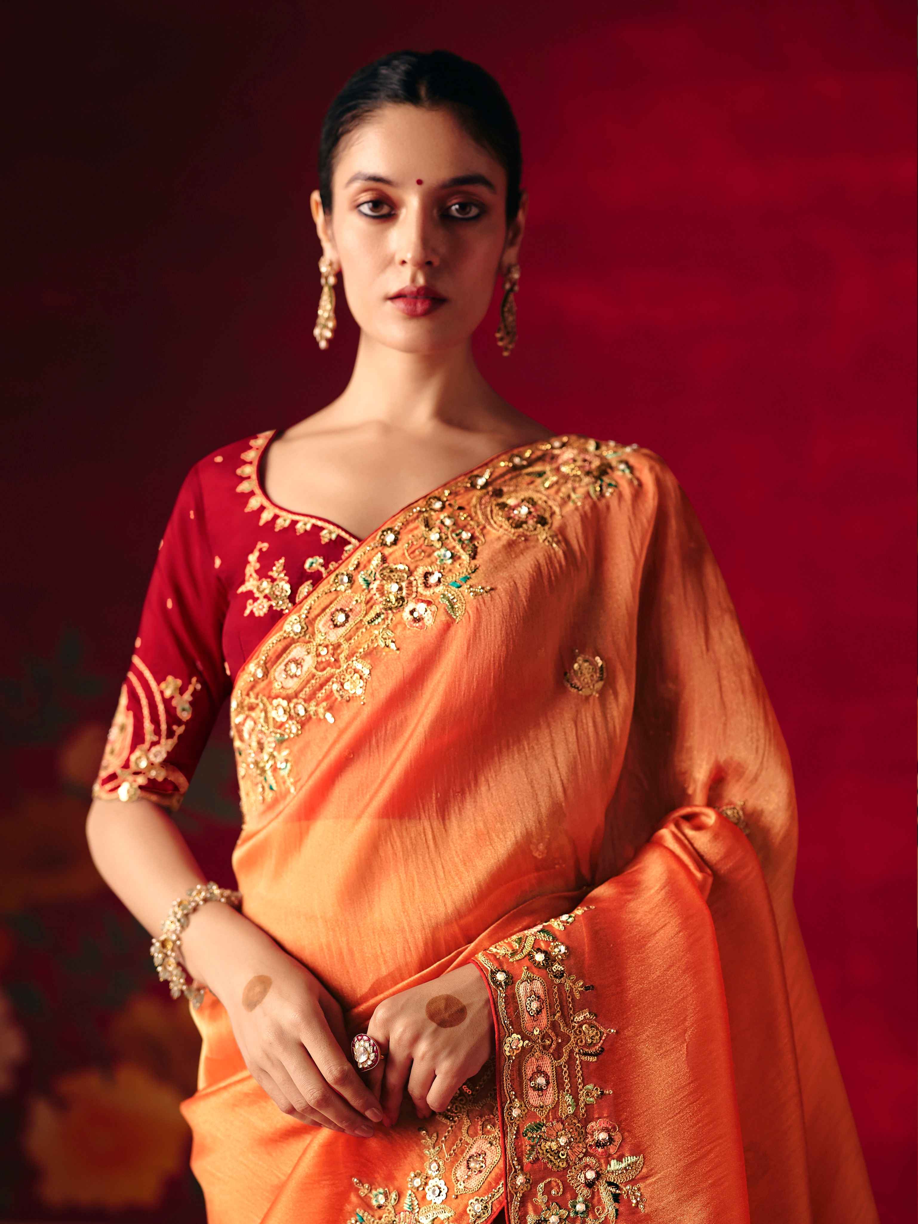 Orange Fancy Saree with Sequins Butti & Rich Border Embroidery