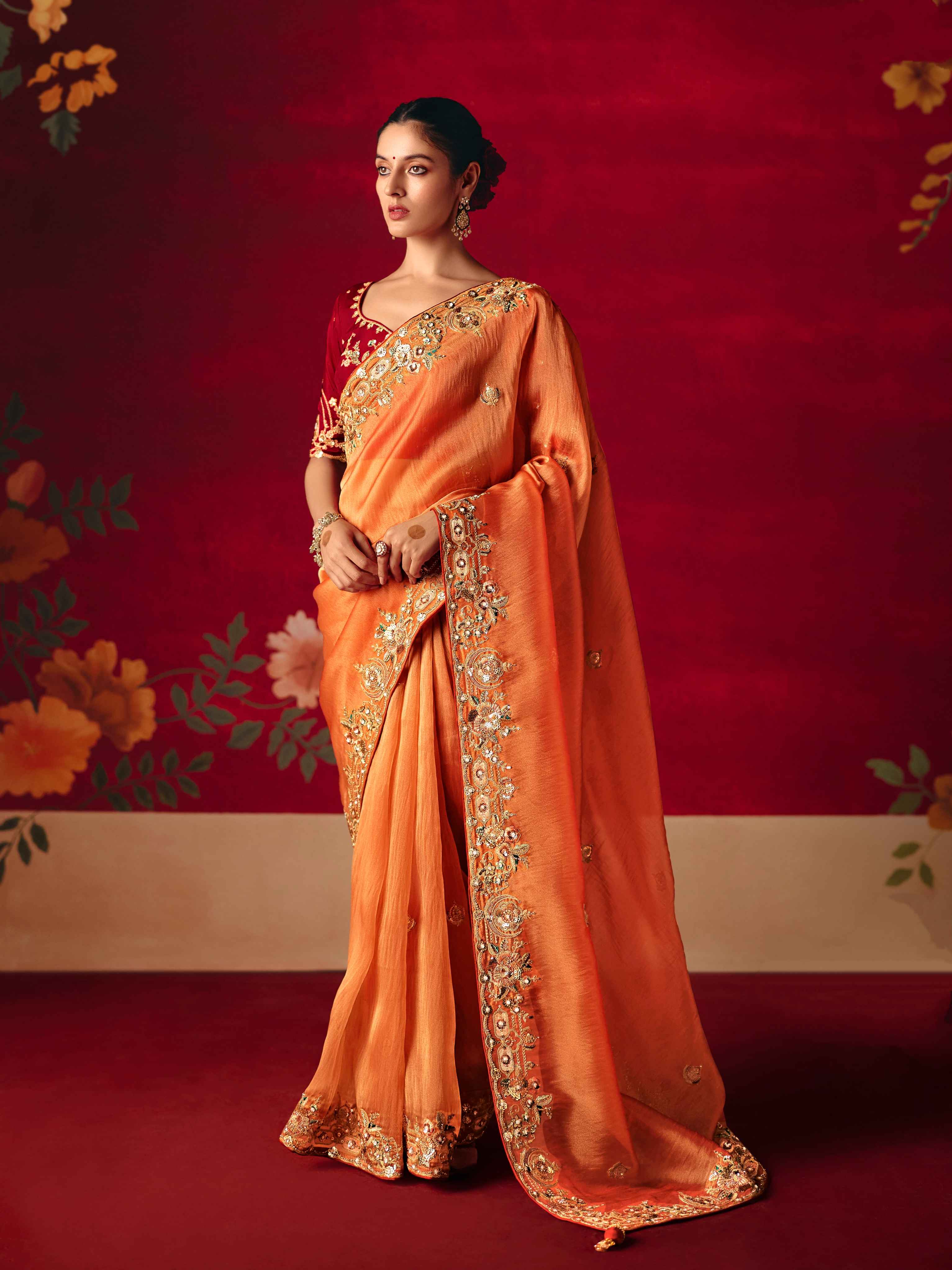 Orange Fancy Saree with Sequins Butti & Rich Border Embroidery