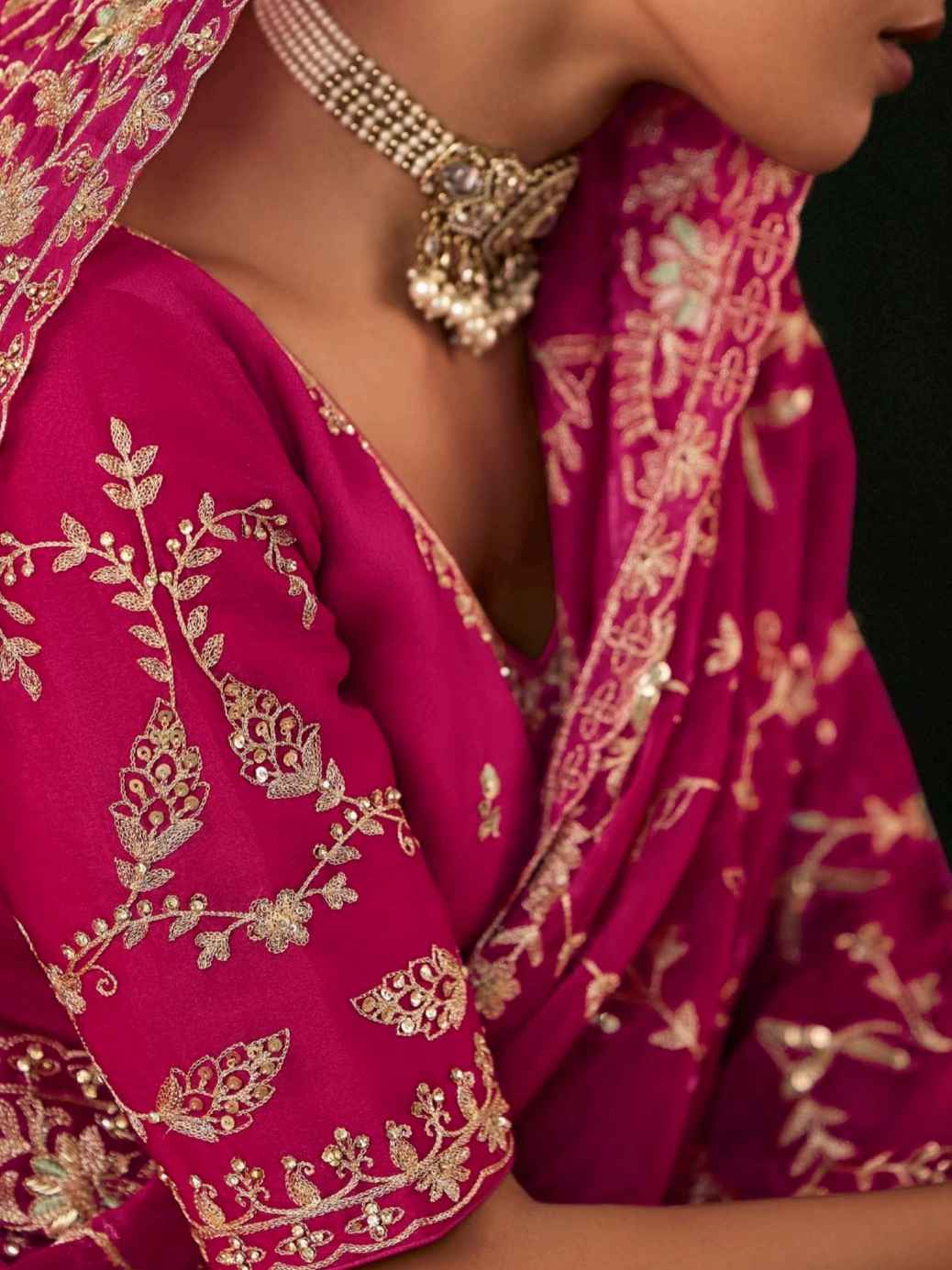 Rani Pink Fancy Saree with Intricate Aari Work