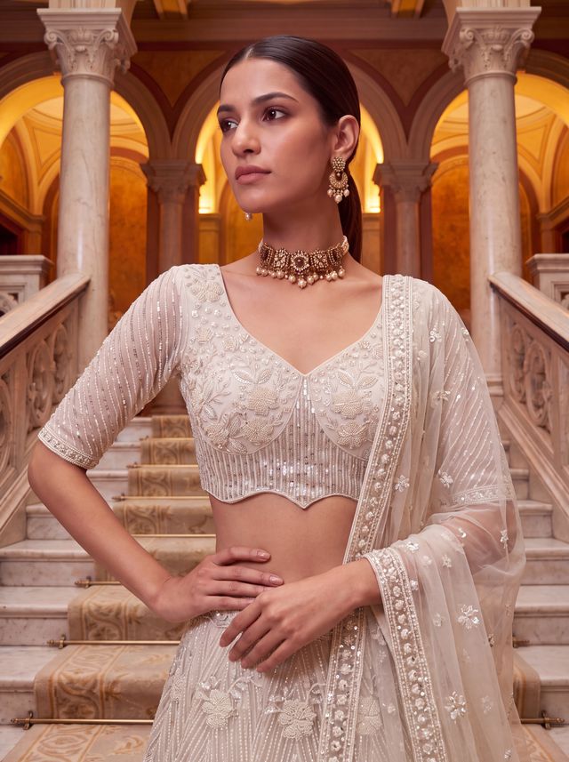 White Pure Heavy Net Motif Handwork Zari Sequins Work Bridal Lehenga Choli