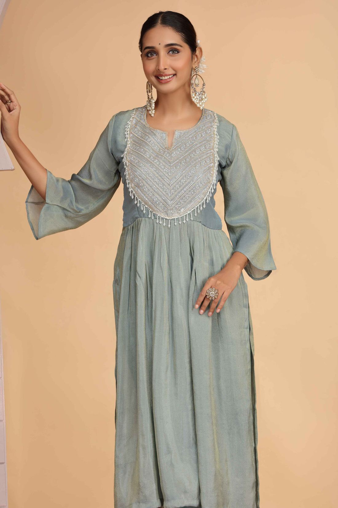 Firozi Shimmer Organza Pleated A-Line Kurta Pant Set Kurta Set Anant Tex Exports Pvt.Ltd..