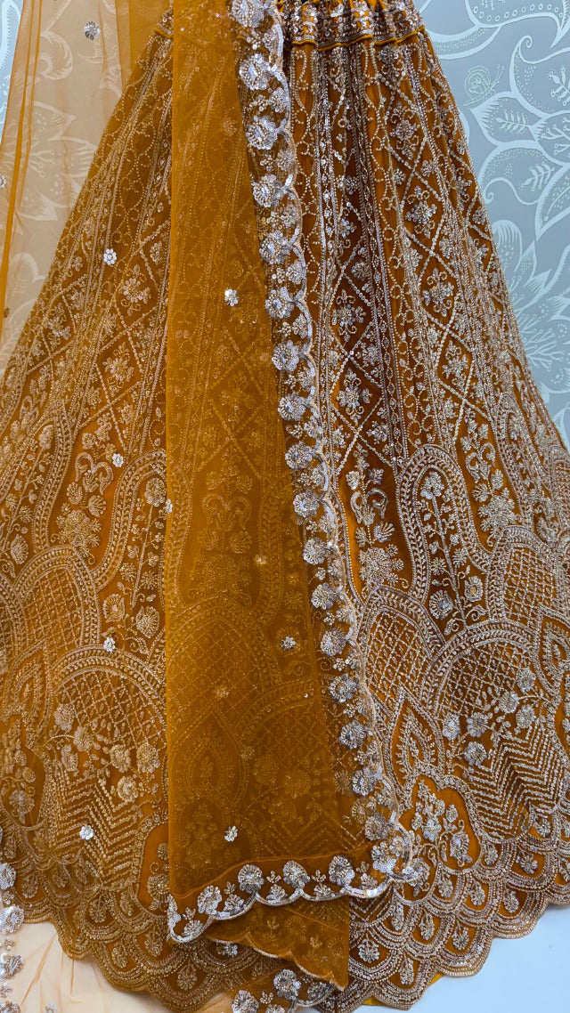 Rust Pure Heavy Net Motif Handwork Zari Sequins Work Bridal Lehenga Choli
