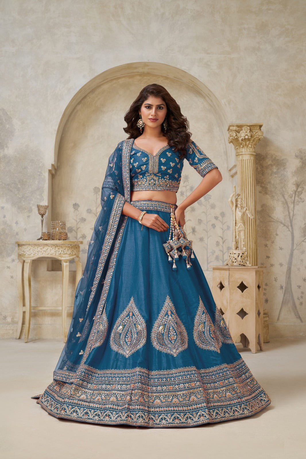 Teal Blue Silk Leaf Embroidered Wedding Lehenga with Net Dupatta