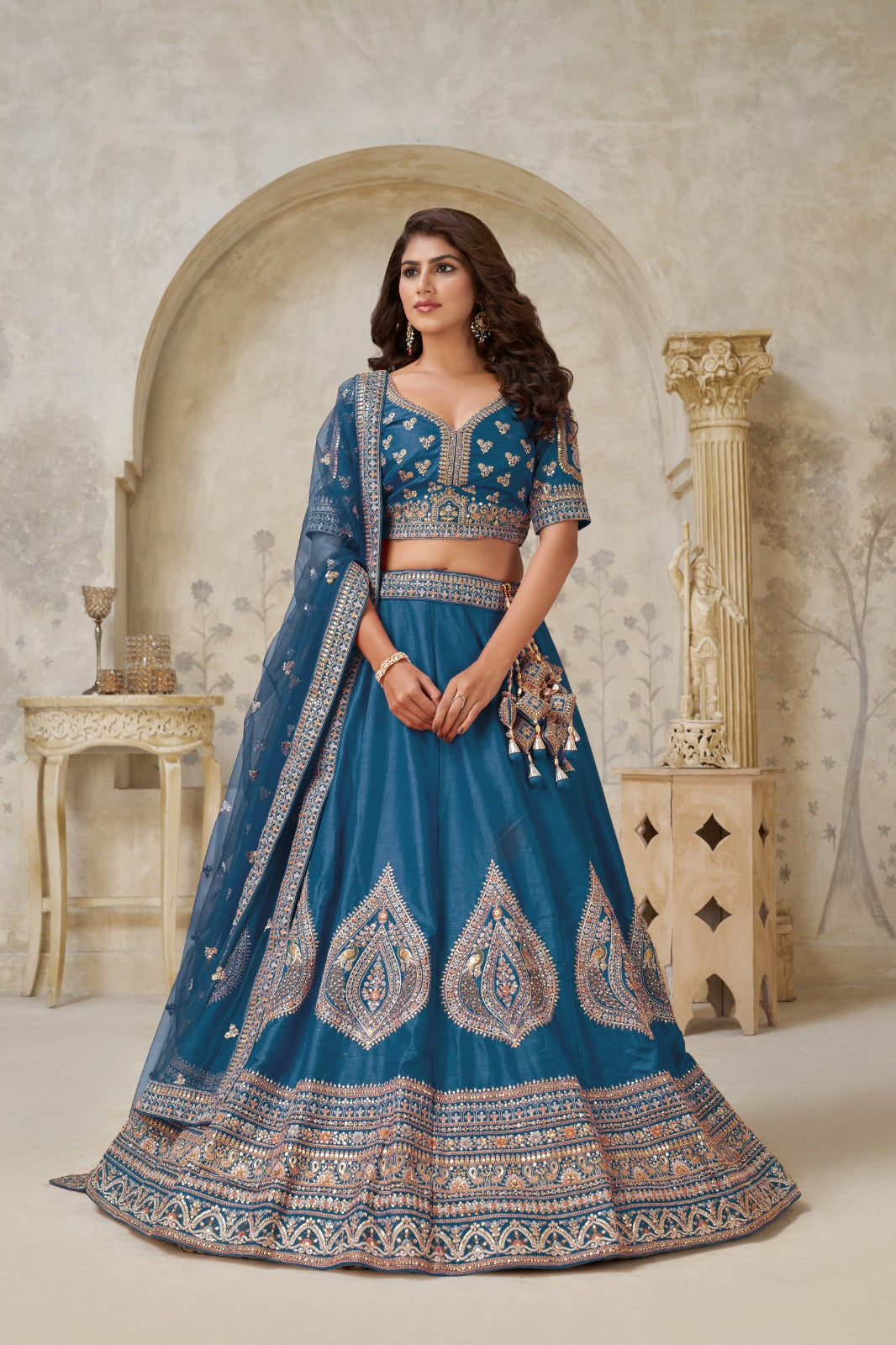 Teal Blue Silk Leaf Embroidered Wedding Lehenga with Net Dupatta