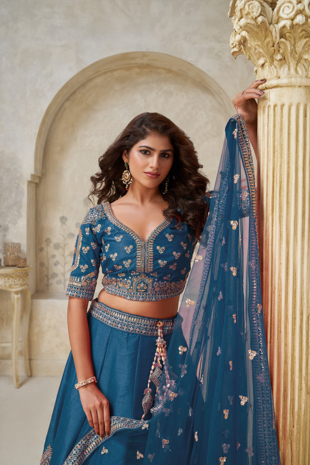Teal Blue Silk Leaf Embroidered Wedding Lehenga with Net Dupatta