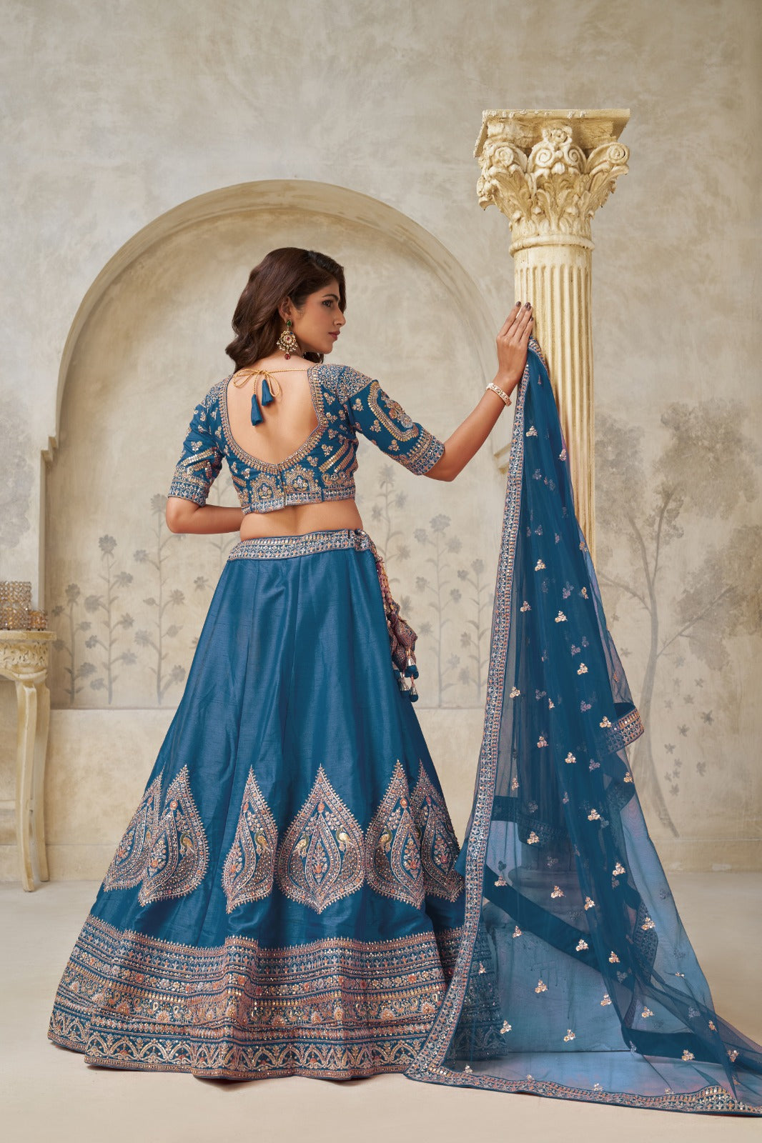 Teal Blue Silk Leaf Embroidered Wedding Lehenga with Net Dupatta