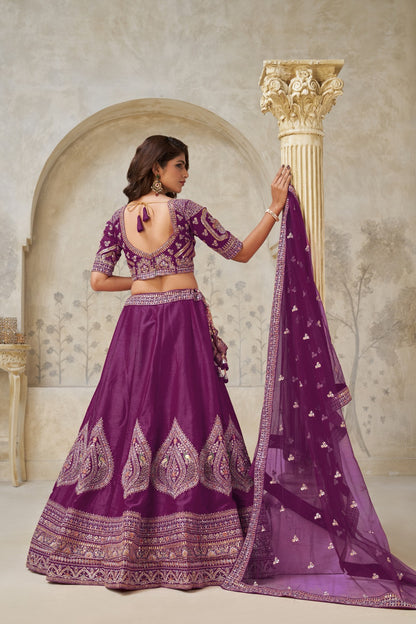 Purple Silk Embroidered Bridal Lehenga with Designer Net Dupatta Silk lehenga Anant Tex Exports Pvt.Ltd..