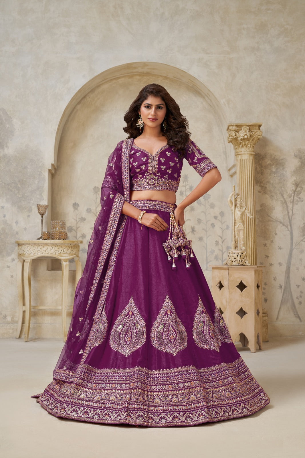 Purple Silk Embroidered Bridal Lehenga with Designer Net Dupatta Silk lehenga Anant Tex Exports Pvt.Ltd..